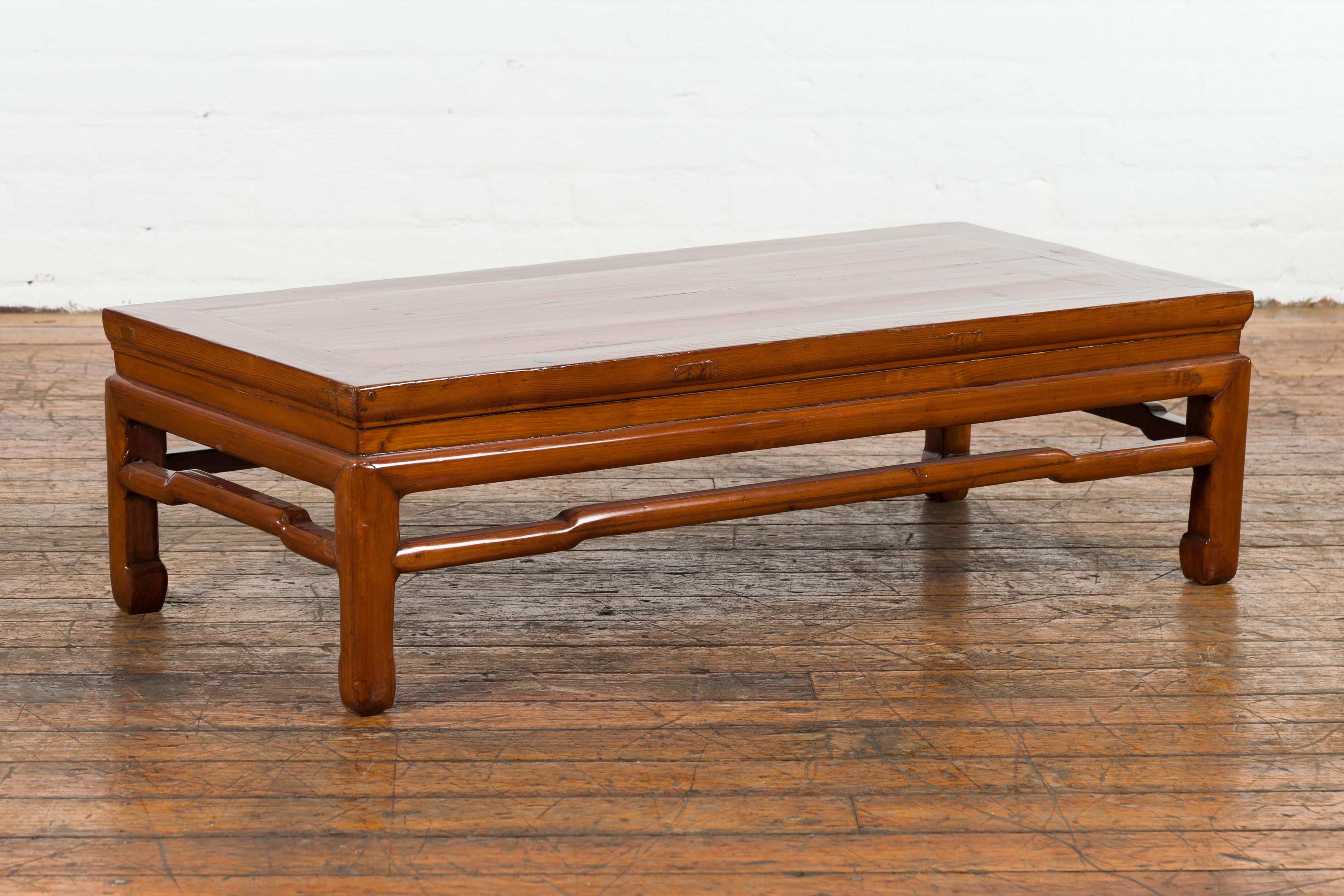 Carved Chinese Late Qing Dynasty Period Low Kang Coffee Table with Brown Lacquer For Sale