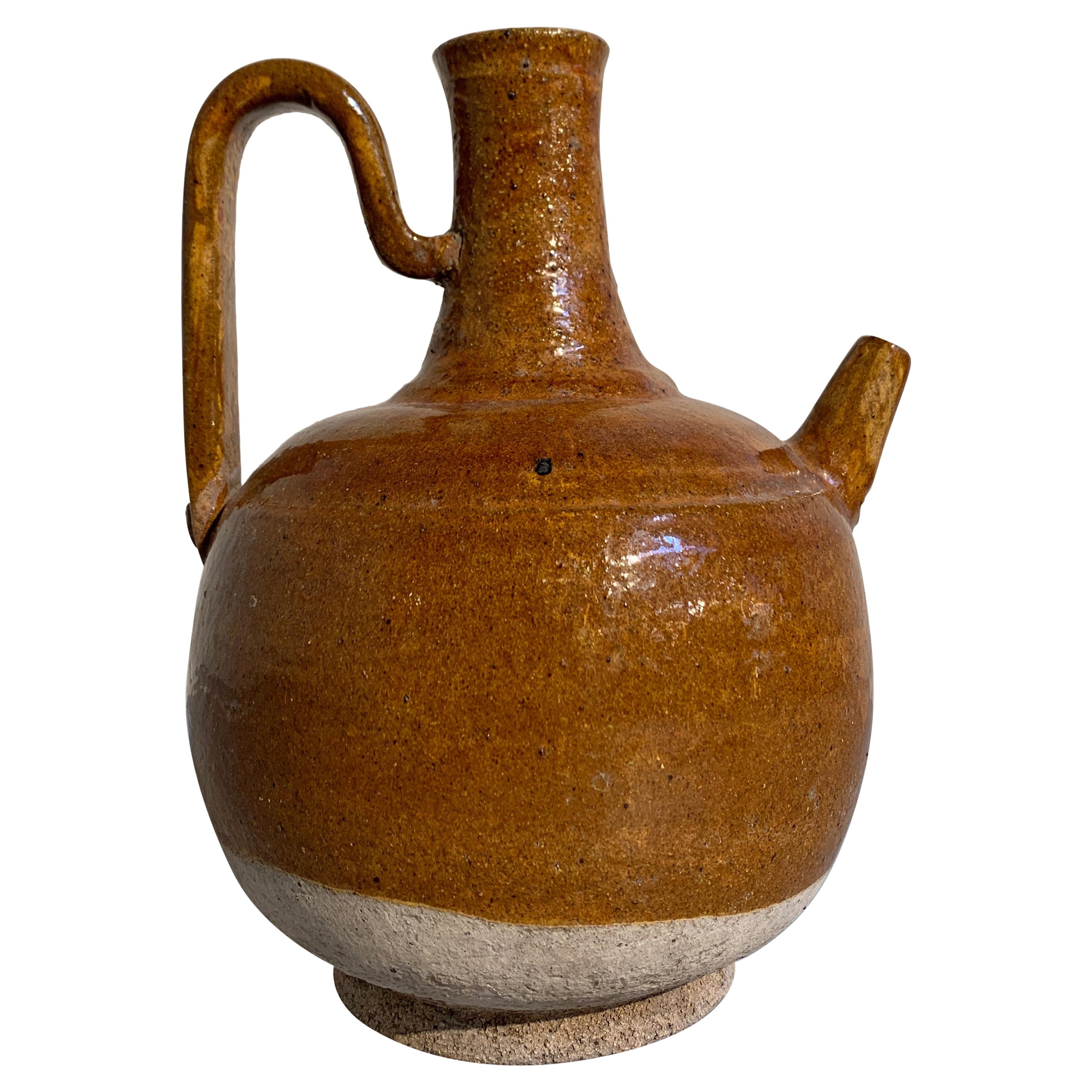 Chinese Liao Dynasty Amber Glazed Stoneware Strap Handle Ewer, 11th Century