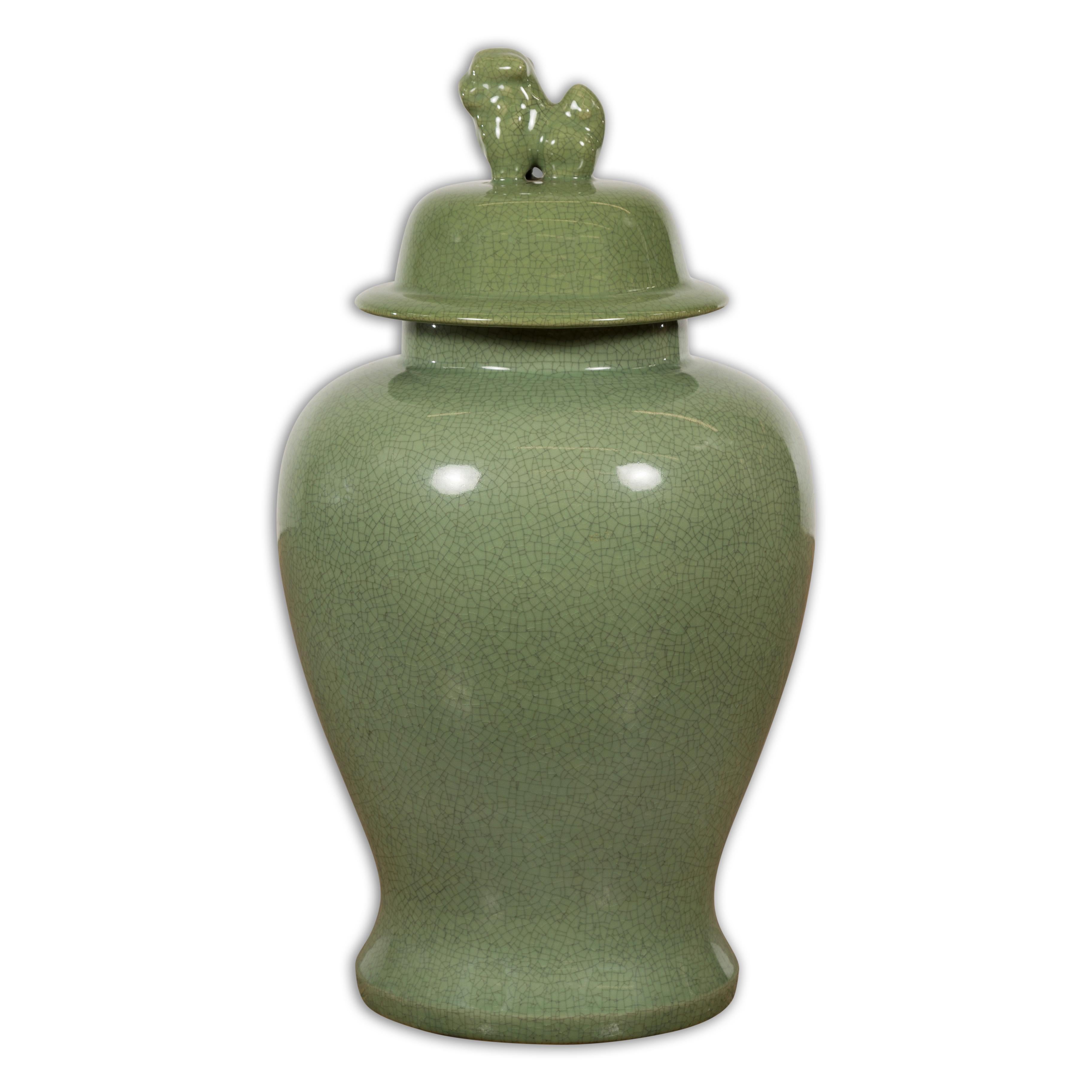 Chinese Lidded Altar Vase with Green Celadon Glaze and Guardian Lion Motif For Sale 10