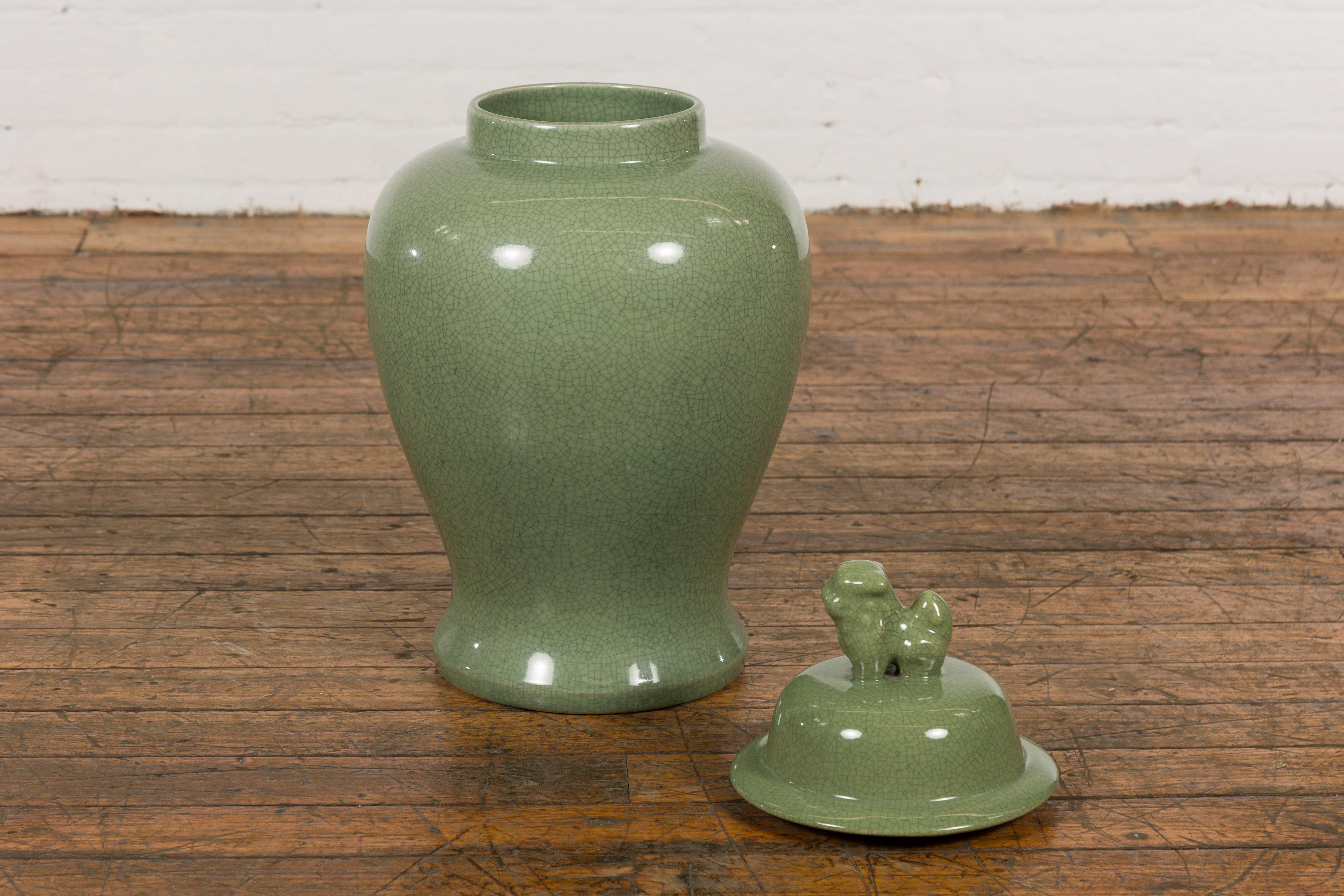 Chinese Lidded Altar Vase with Green Celadon Glaze and Guardian Lion Motif For Sale 3
