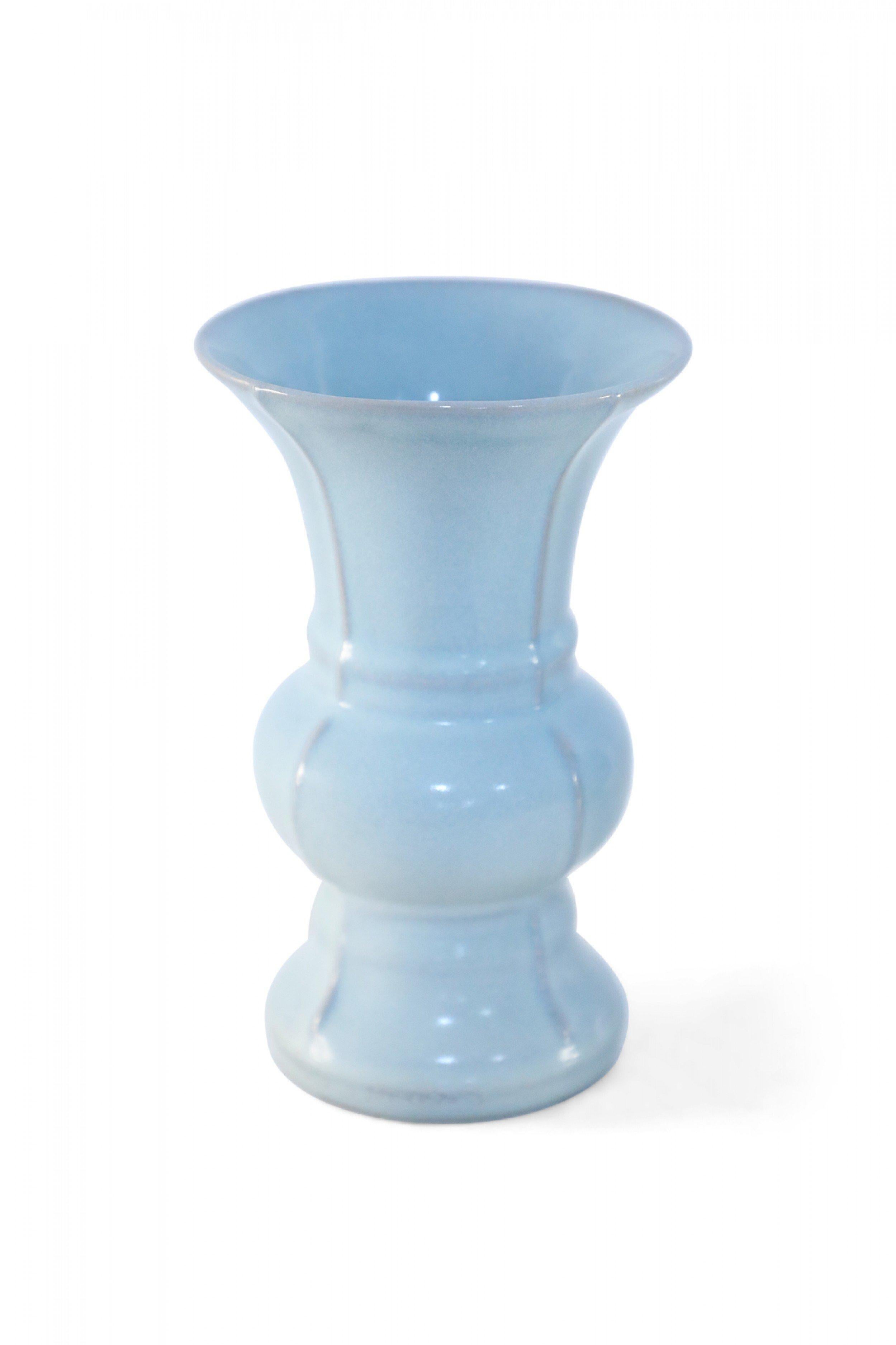 Chinese (20th Century) light blue porcelain vase with a beaker shape and crackled finish.
    