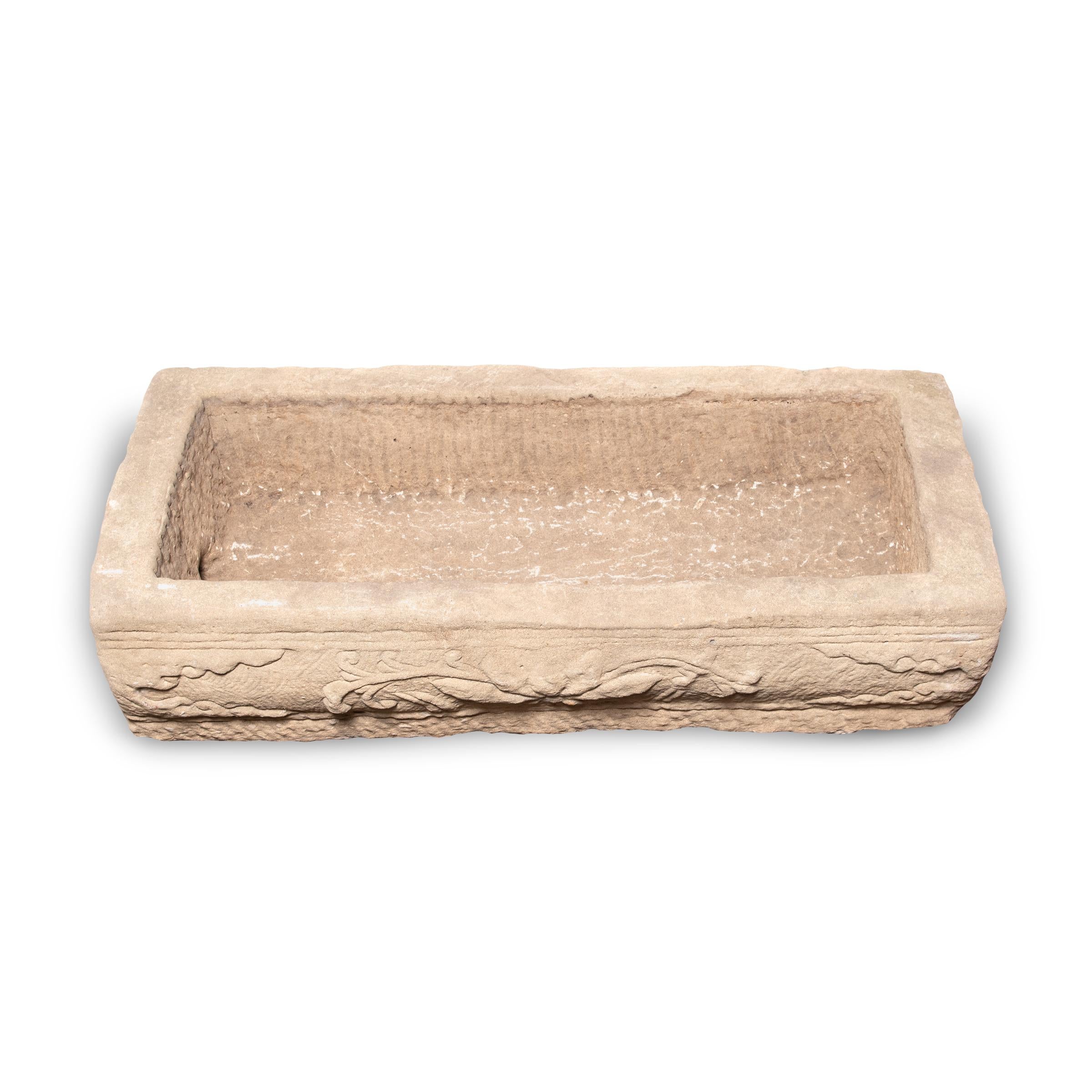 Prized mounts once took refreshment from this stone trough, carved from a solid block of limestone more than one hundred years ago. Once purely functional, the trough is celebrated today for its elegant form, rustic authenticity, and beautifully