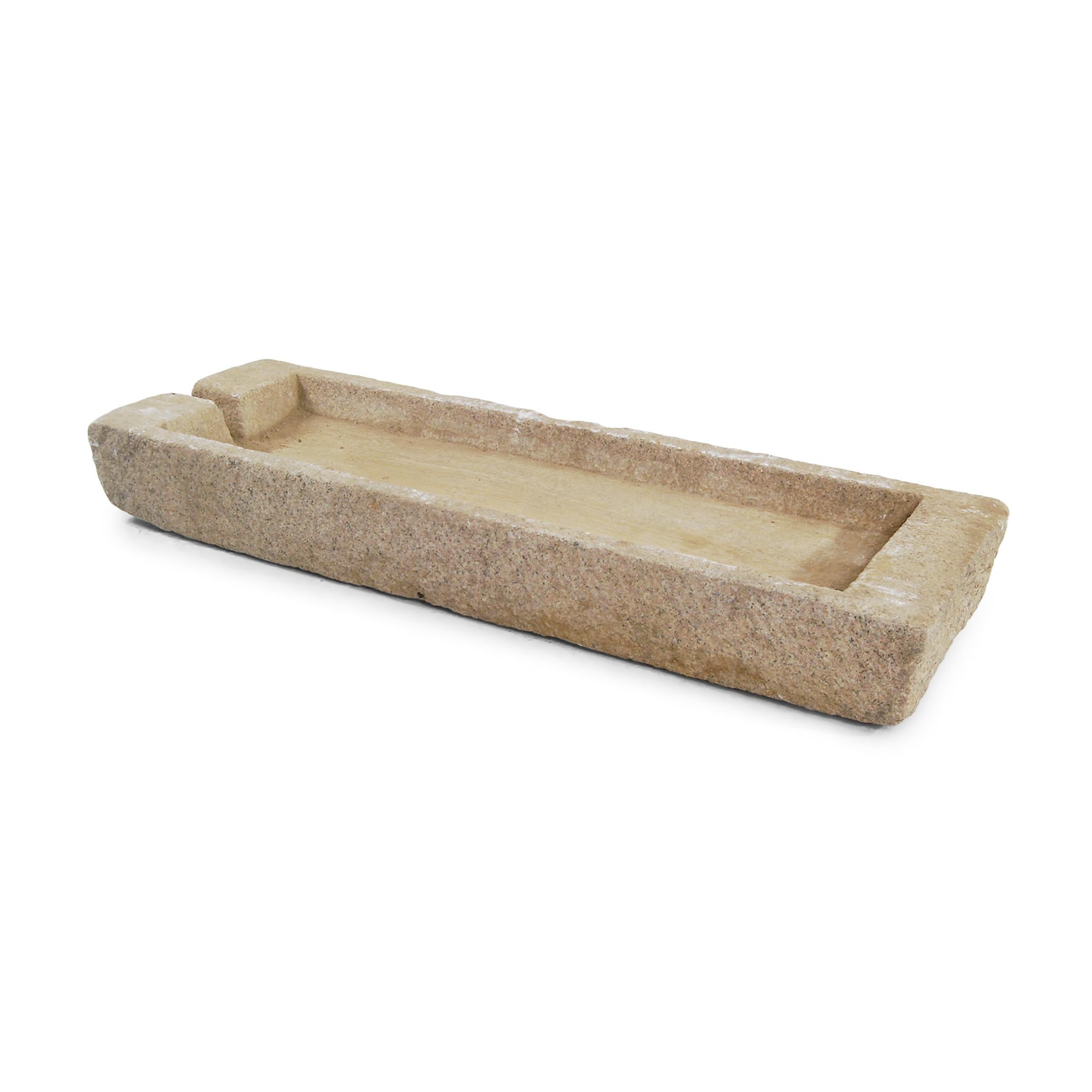 Prized mounts once took refreshment from this stone trough, carved from a solid block of limestone more than hundred years ago. Once purely functional, the trough is celebrated today for its elegant, simple form and rustic authenticity. A wonderful