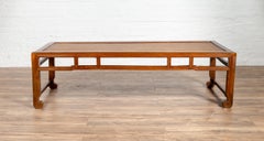 Chinese Long Coffee Table with Elmwood Patina, Scrolled Feet and Humpback Apron