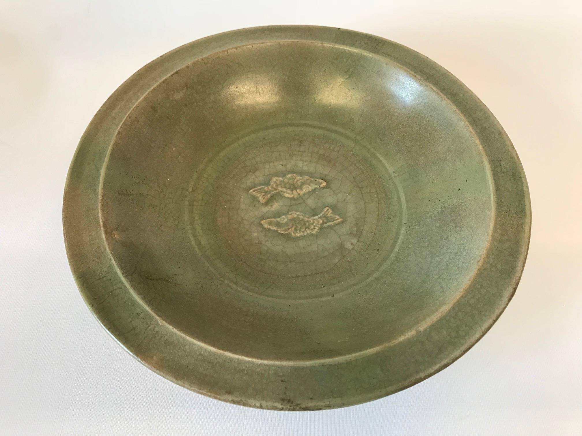 Rare southern song dynasty Longquan celadon bowl with twin fish
Authenticated and stamped by the National museum of the Philippines.

 