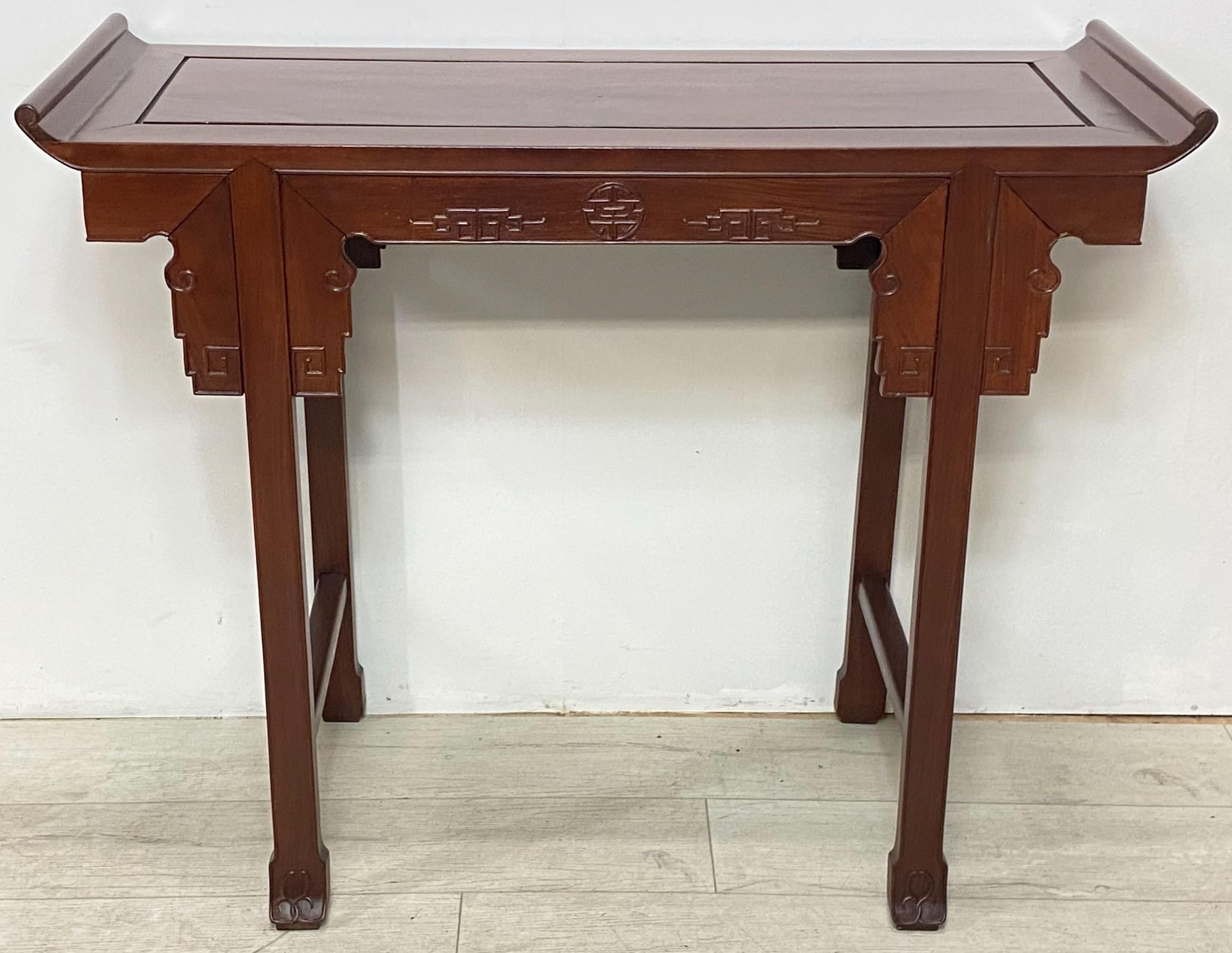 Carved mahogany altar or console style table.
China, mid 20th century.
Recently re-finished.


 