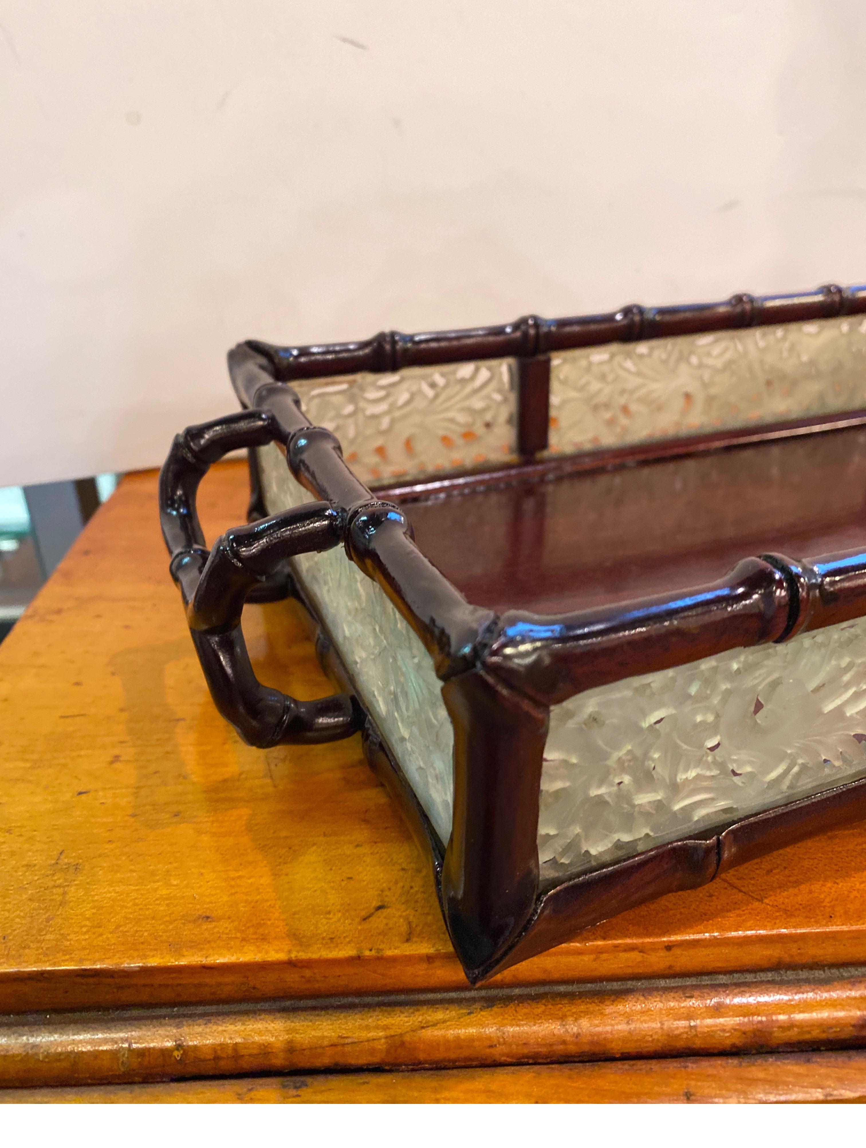 An antique Chinese carve wood and carved jade handled tray. The hand carved bamboo motif frame work with carved jade panels fitted all around. Marked on the underside China, dating this to the very early 20th century around 1910 16 inches handle to