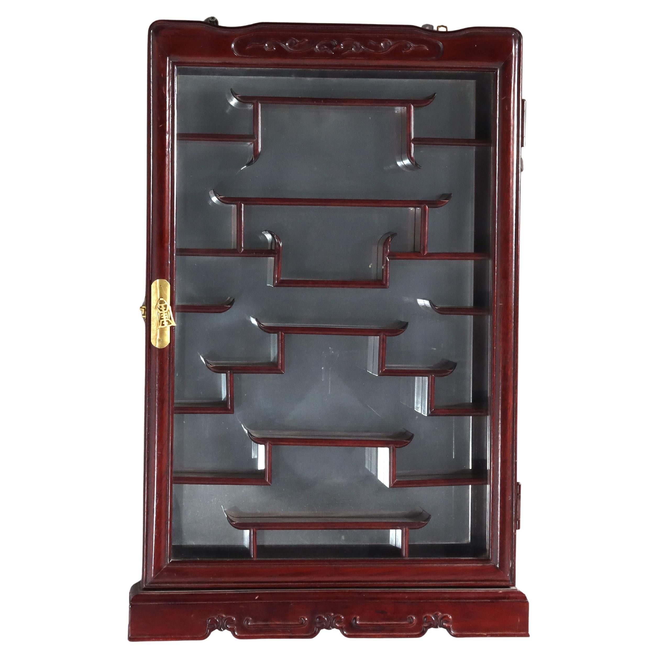 Chinese Mahogany Hanging Curio Wall Cabinet with Offset Display Shelves 20thC For Sale