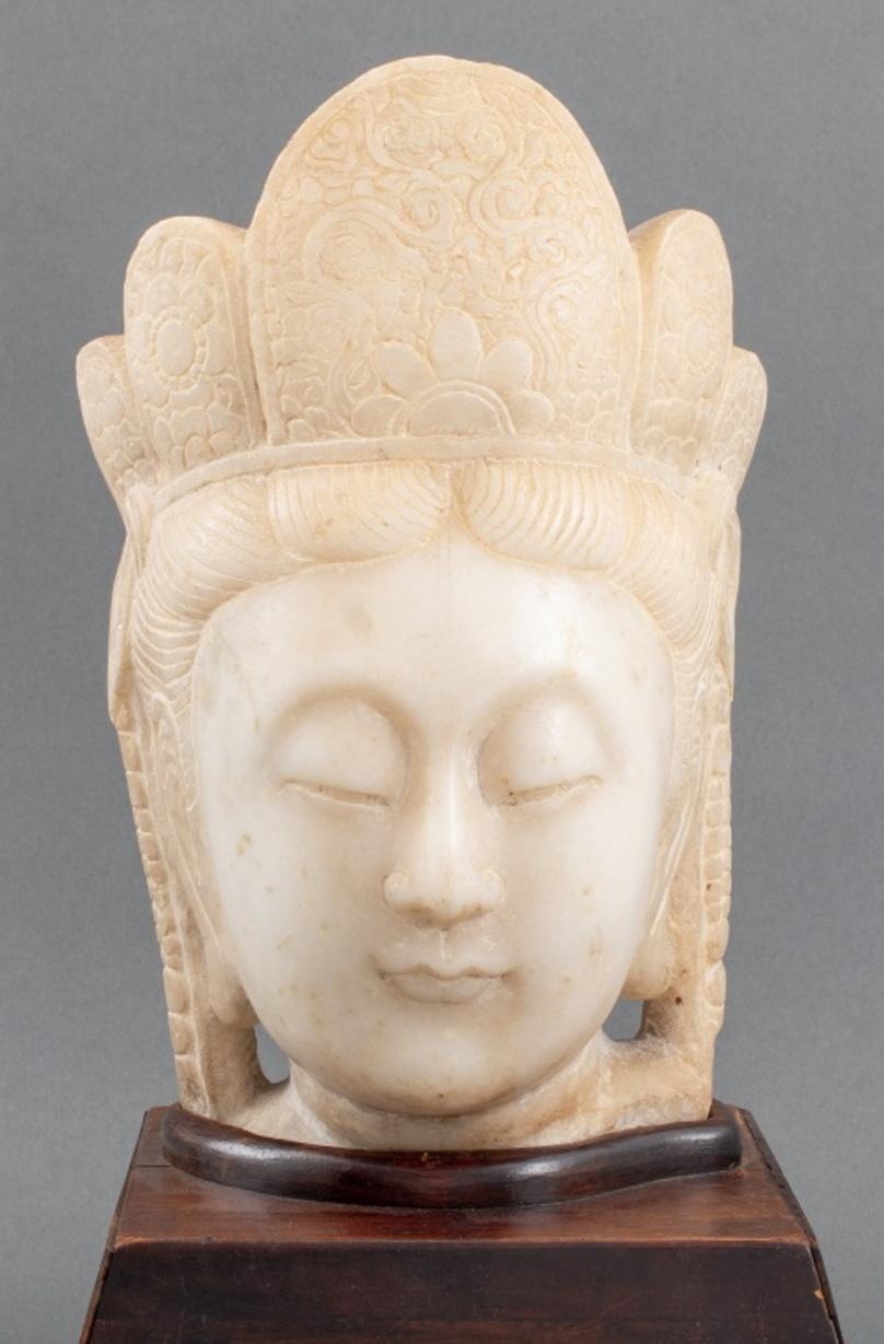 Chinese marble Quan Yin head fragment on stand. 17.5