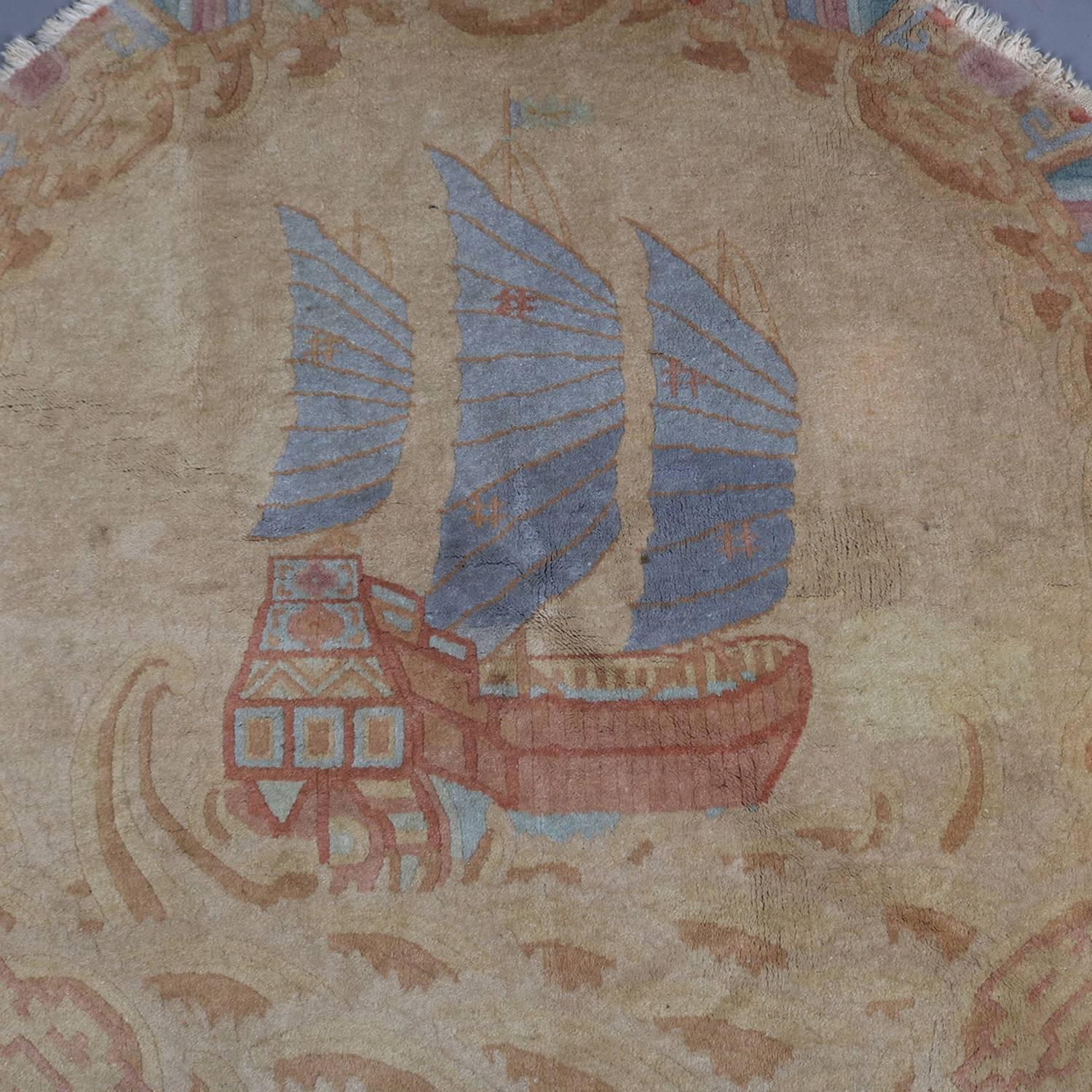 Antique Chinese Nichols round mat with maritime seascape scene with junket sailing cargo ship, circa 1920

Measures: 48