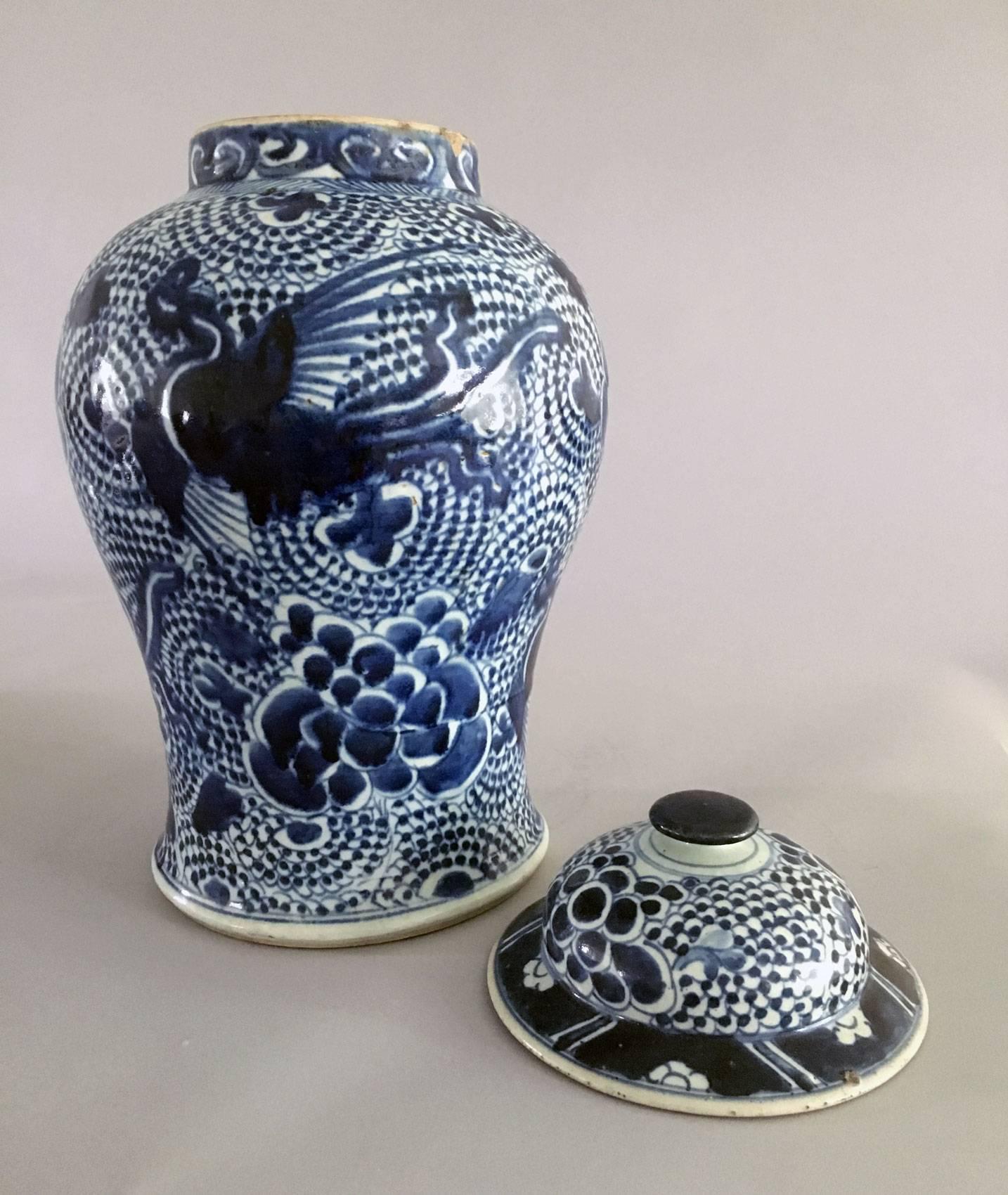 Chinese Export Chinese Matched Pair of Blue and White Vases and Lids For Sale