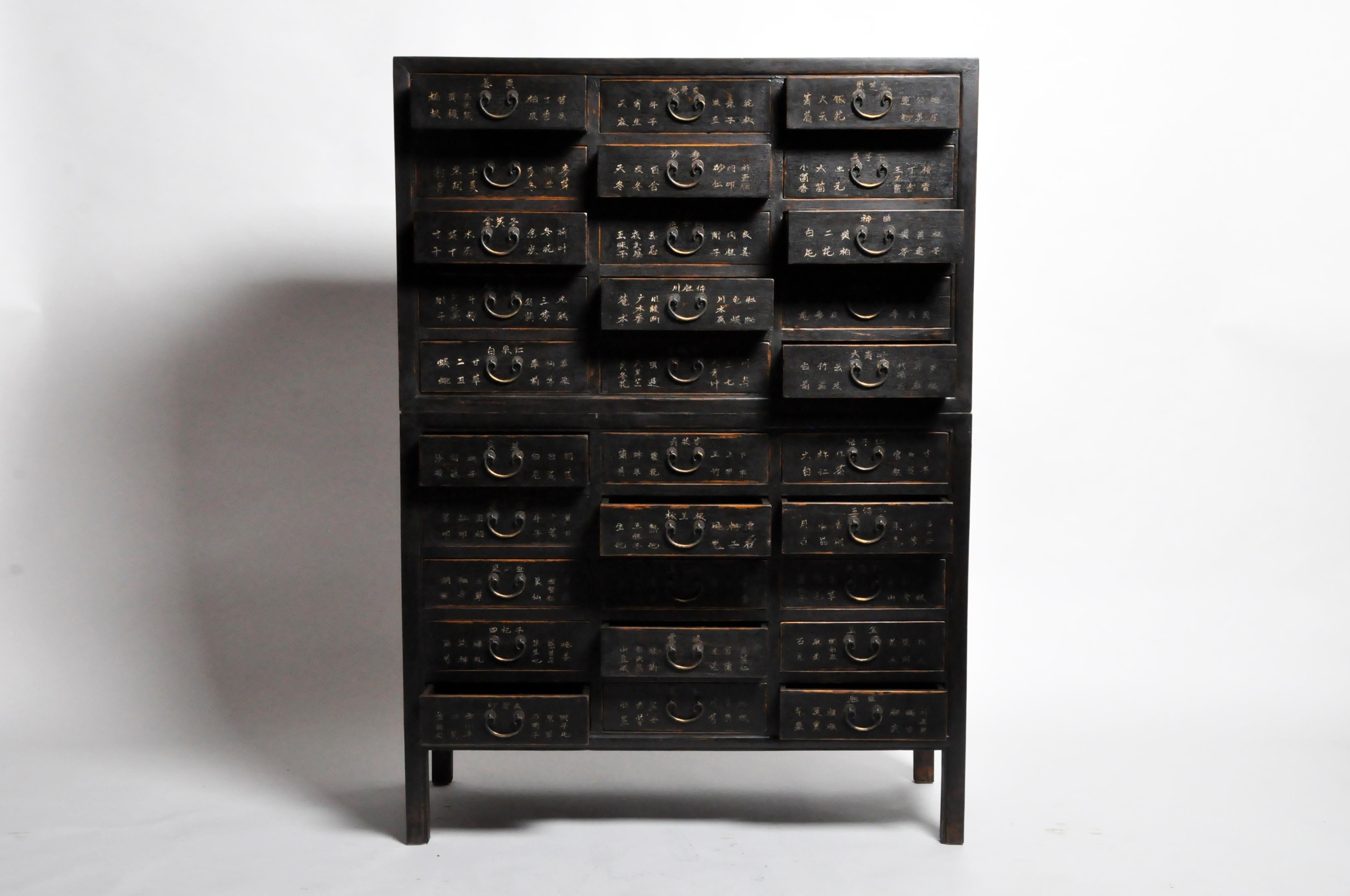 Chinese doctors used chests like this to store medicinal herbs, extracts, and powdered minerals. Sometimes multiple chests were arranged in banks to offer the herbalist the greatest selection of ingredients for a medicinal cure or balm. The