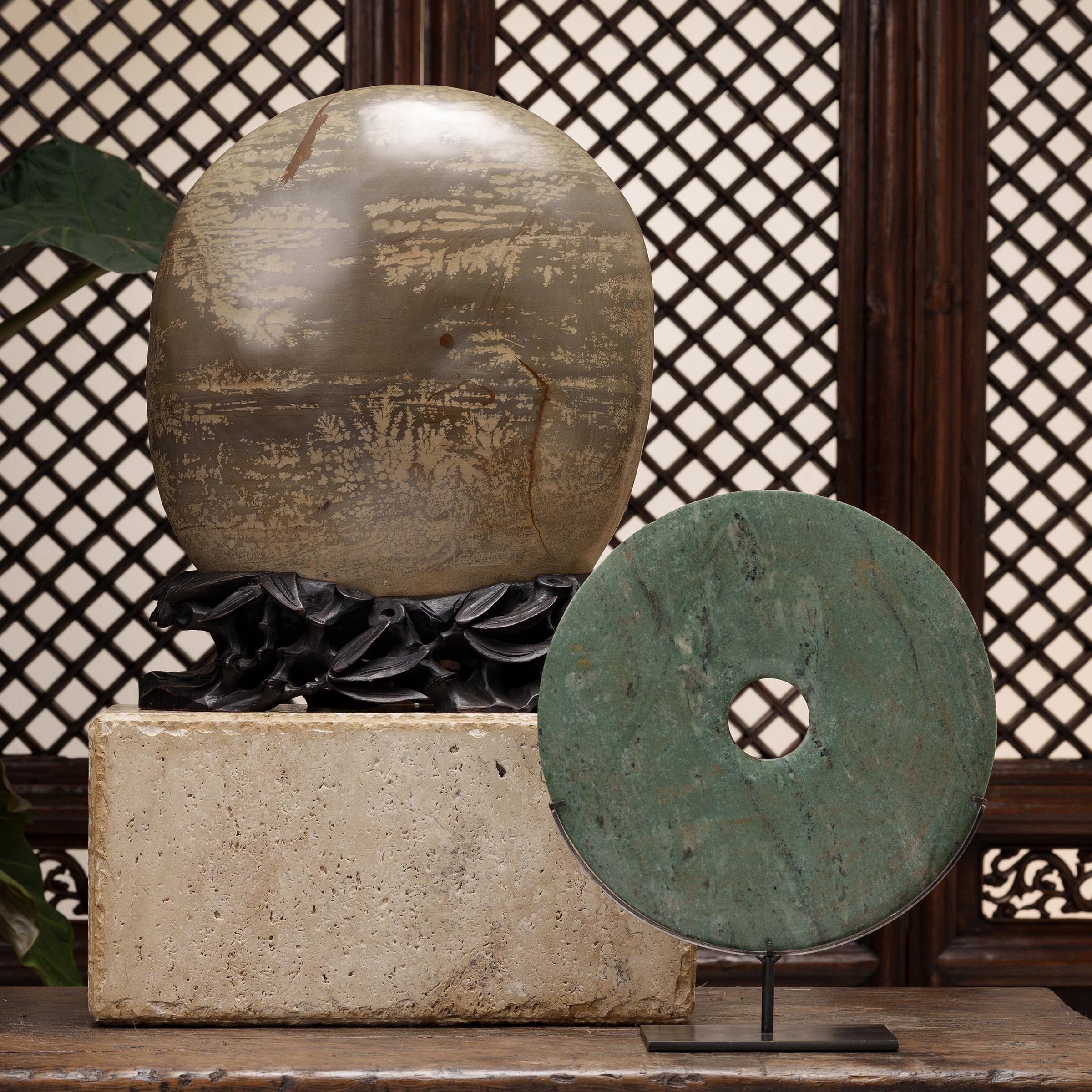 A well-chosen stone is a focal point of both a traditional Chinese garden and a scholar's studio, evoking the grandeur of nature and inspiring creative thought. Meditation stones offer the mind a place to focus - not unlike modern abstract art, each