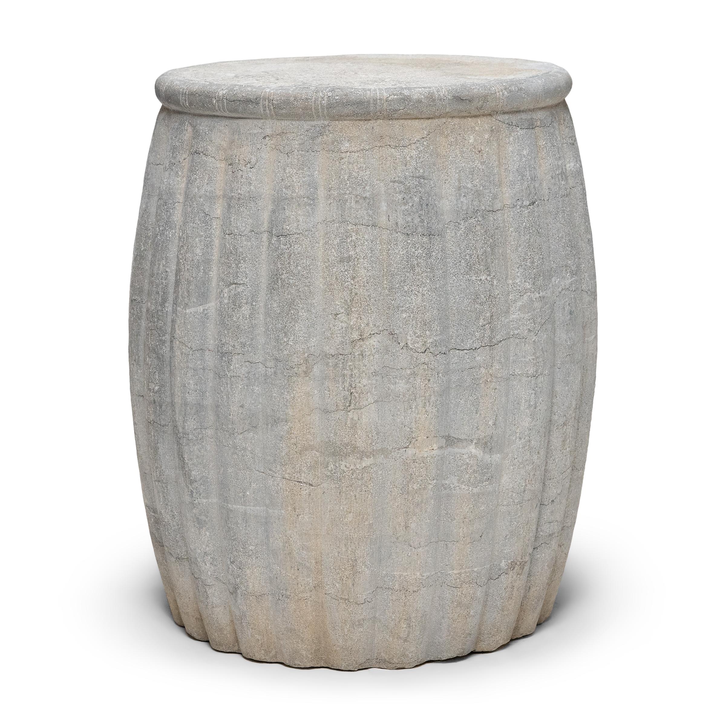 Drum-form stools such as this were traditionally used in gardens and outdoor pavilions where upper class scholars read, wrote, gathered for discussion and, in general, developed their inner sensibilities. This contemporary example is carved from