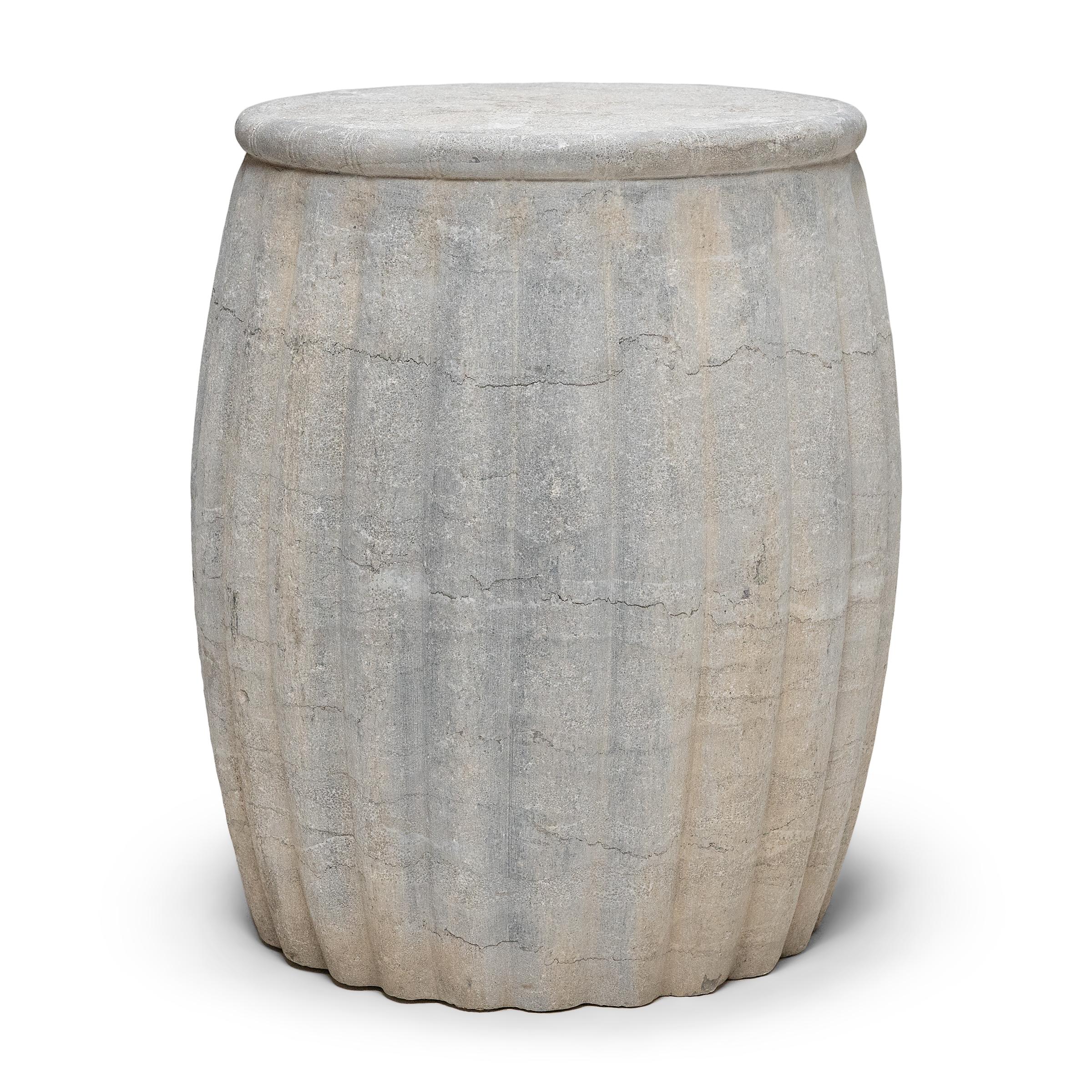 Drum-form stools such as this were traditionally used in gardens and outdoor pavilions where upper class scholars read, wrote, gathered for discussion and, in general, developed their inner sensibilities. This contemporary example is carved from