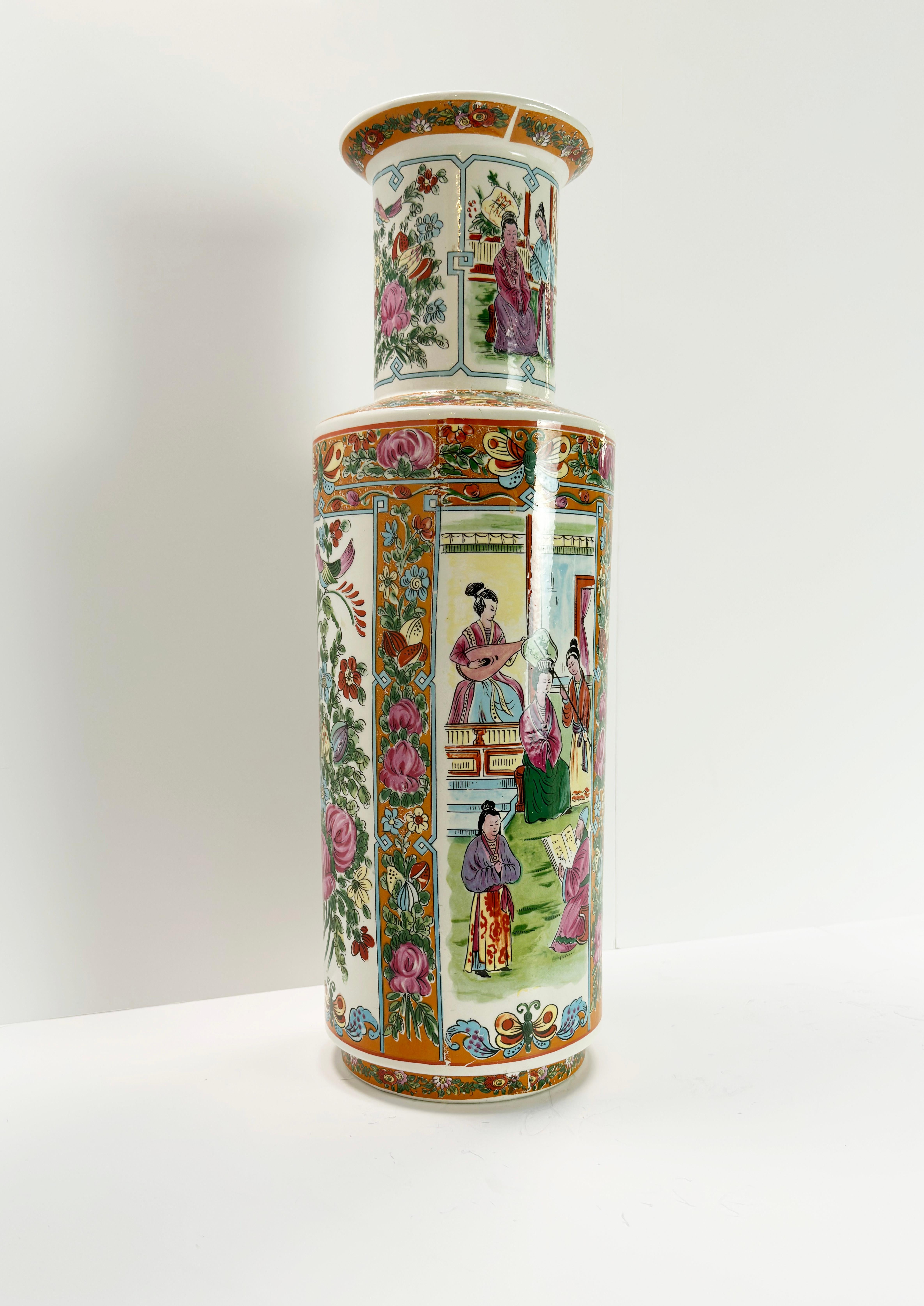 A vibrant and large Chinese Famille Rose porcelain rouleau floor vase 

Add a pop of color and elegance to your space with this eye-catching and large Chinese rouleau floor vase. Adorned in the classic Famille Rose style, it's a testament to the