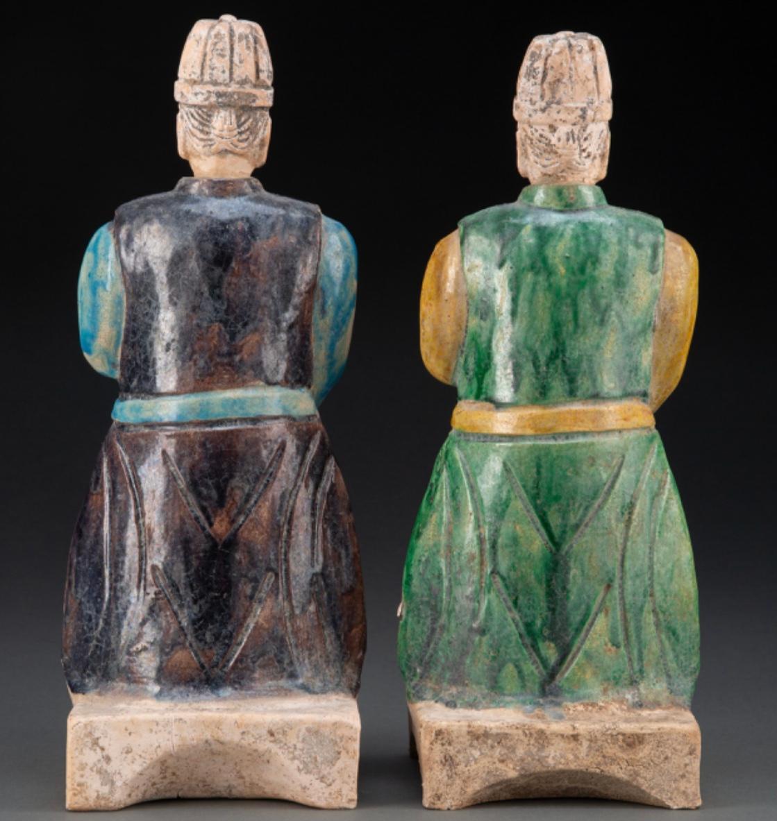 A pair of Chinese Ming Dynasty glazed earthenware figure of Attendant

The condition of these 5 century old glazed pottery tomb figures is outstanding. The Sancai glazes and rare turquoise and purple glaze make these figures stand out. 13 inches