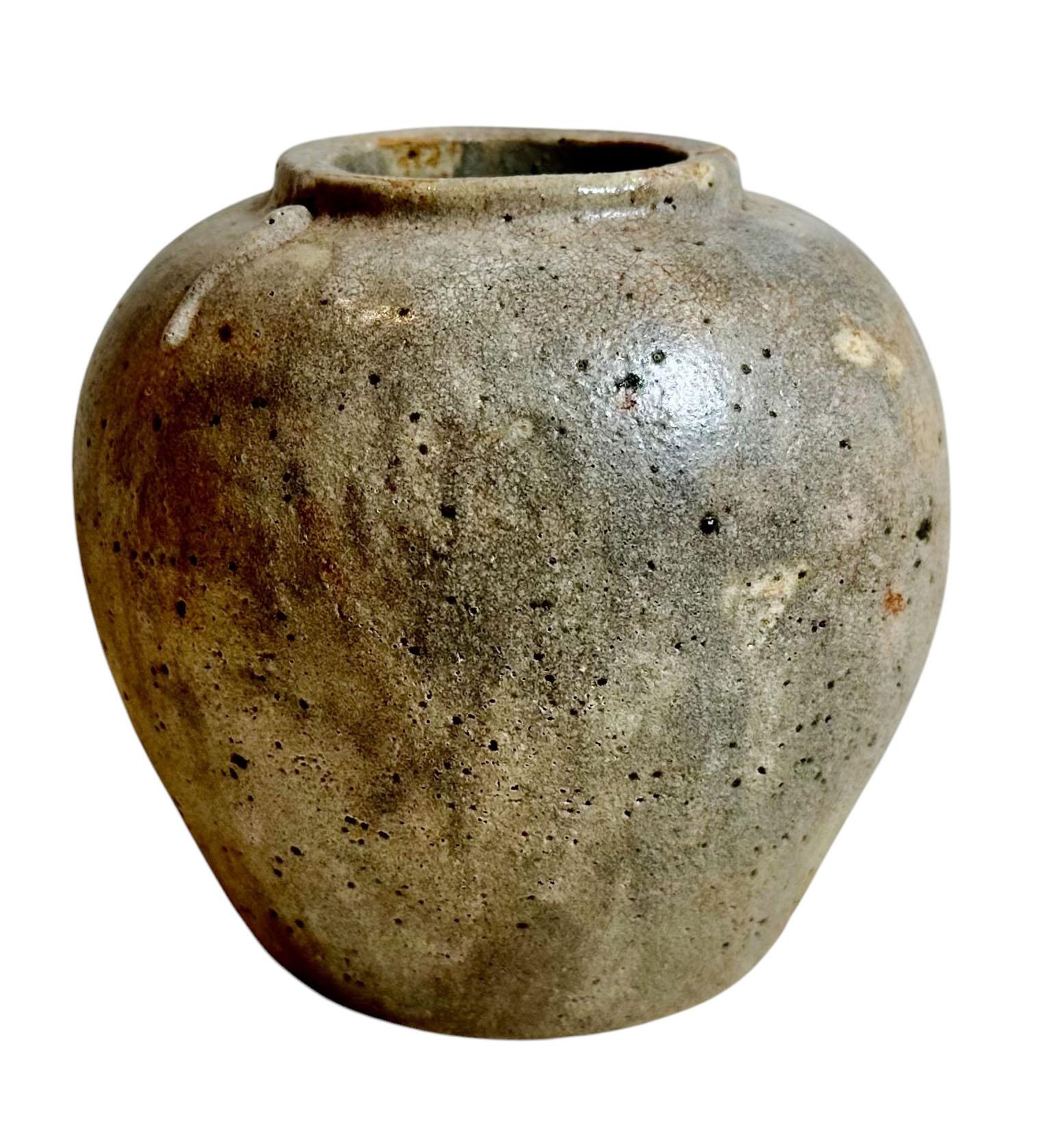 A Ming Dynasty Chinese sandstone pot in very attractive neutral shades. The opening at the top is two inches. China, Ming dynasty so therefore they could be anywhere from the 1300s to the 1600s.