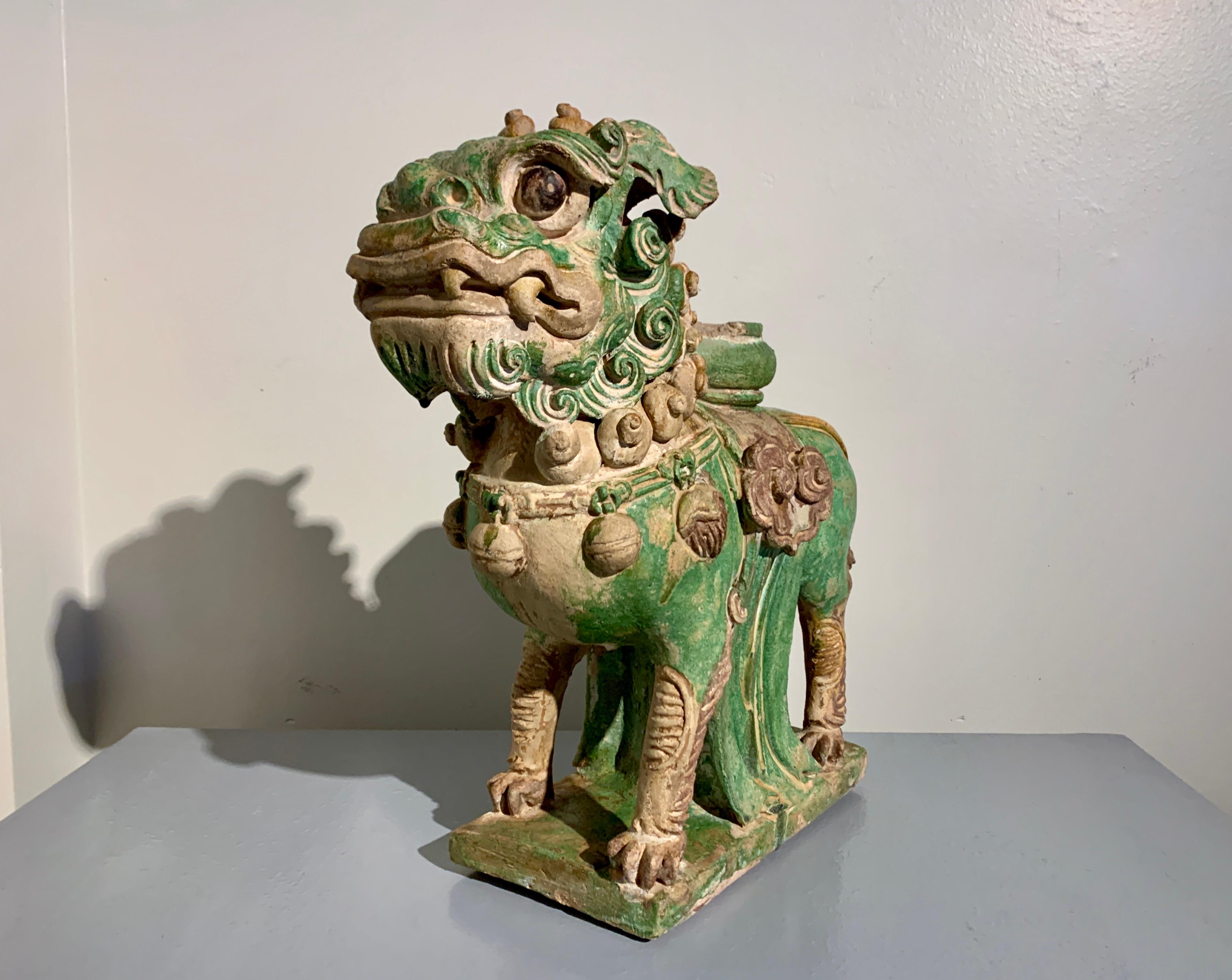 18th Century and Earlier Chinese Ming Dynasty Sancai Glazed Pottery Guardian Lion, late 16th Century For Sale
