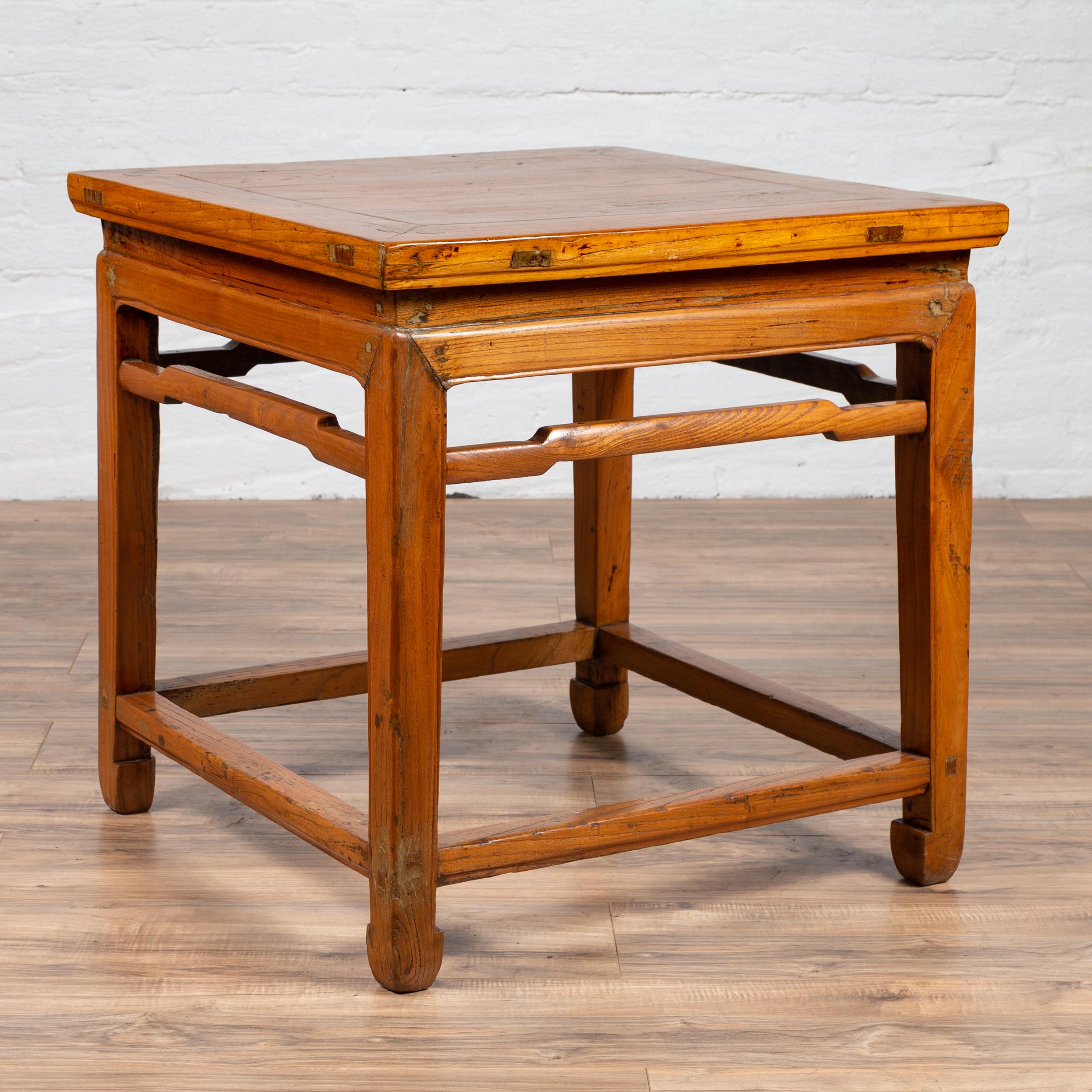 20th Century Chinese Ming Dynasty Style Elm Waisted Side Table with Humpbacked Stretchers