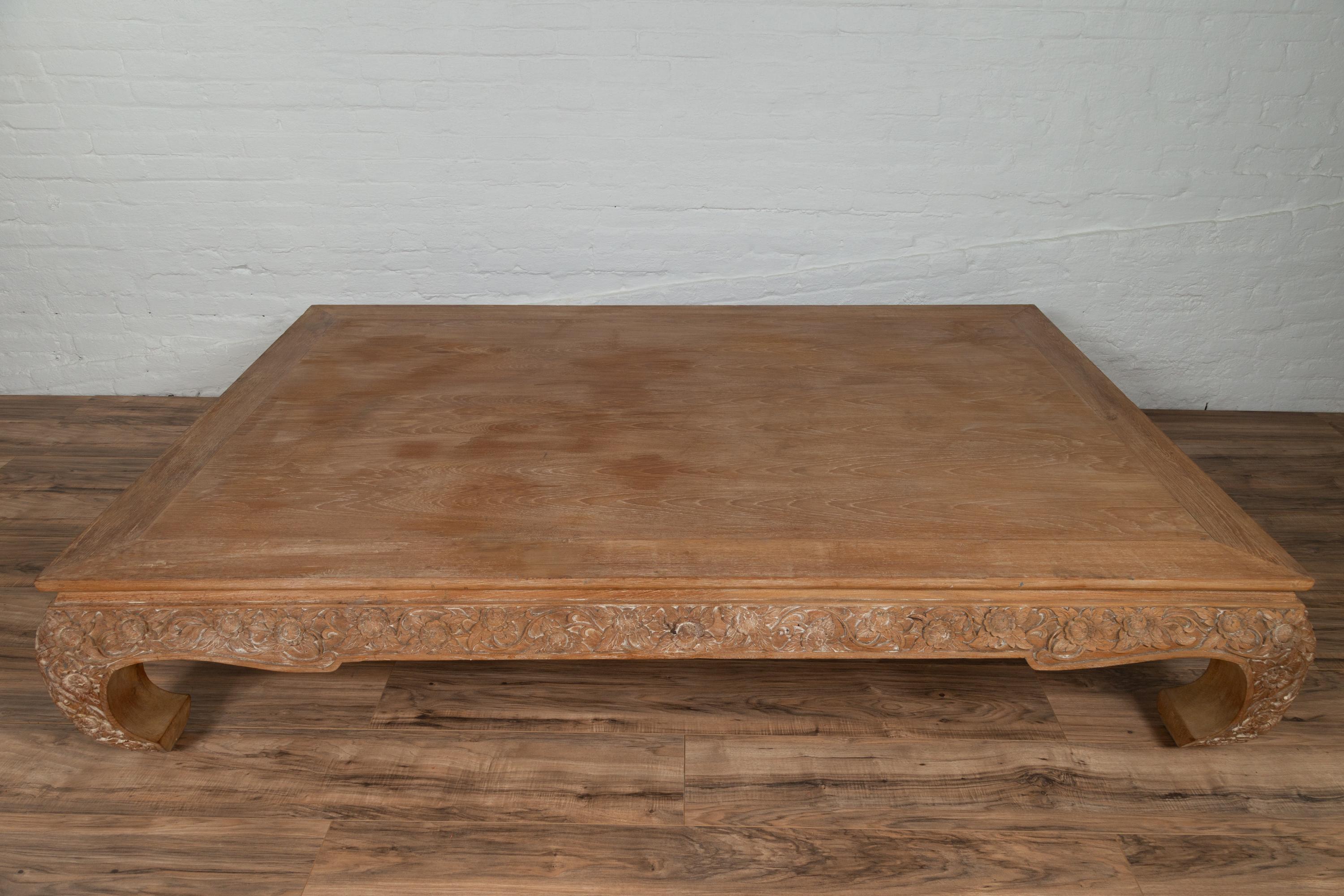 Chinese Ming Dynasty Style Natural Teak Coffee Table with Carved Floral Décor In Good Condition In Yonkers, NY