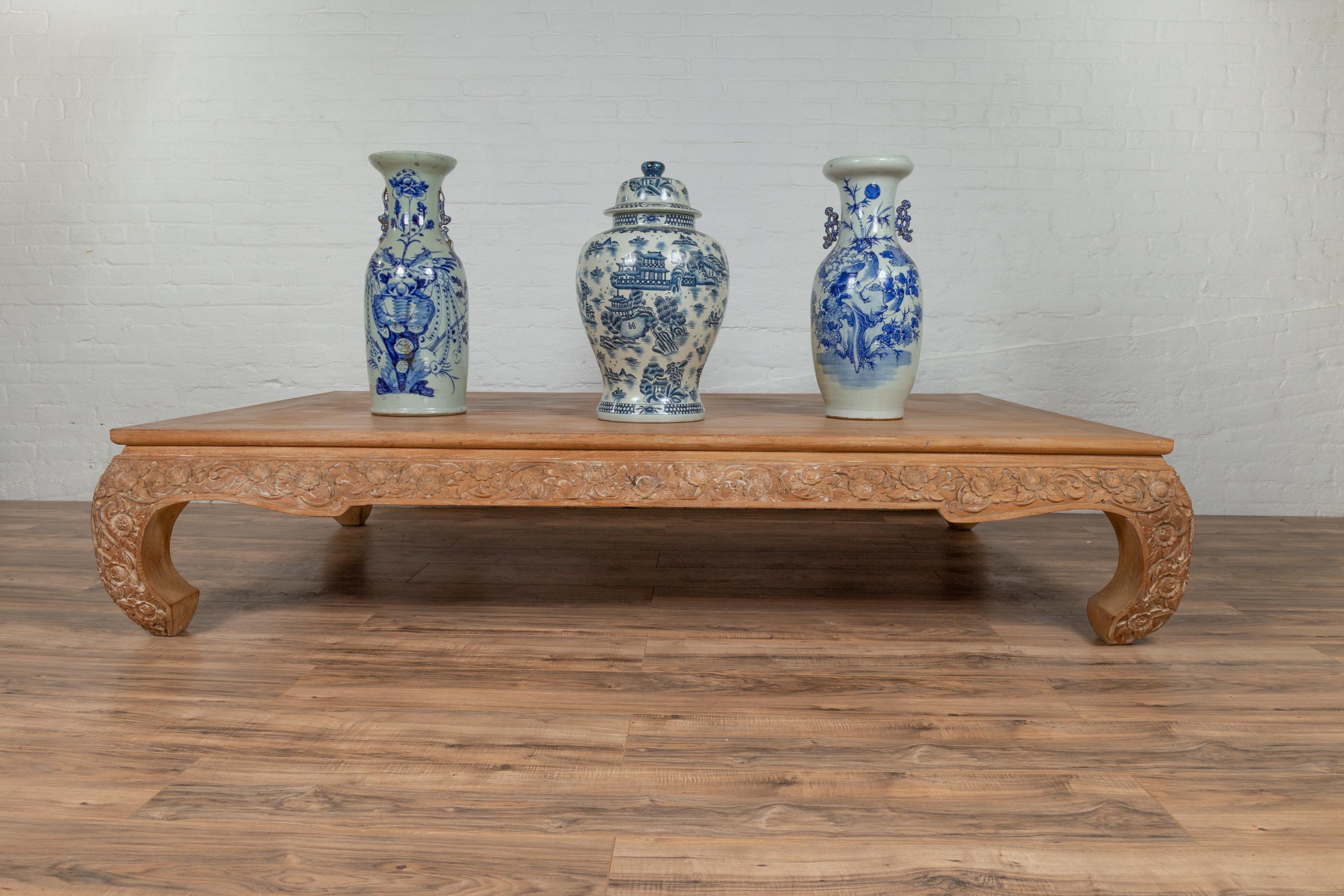 20th Century Chinese Ming Dynasty Style Natural Teak Coffee Table with Carved Floral Décor