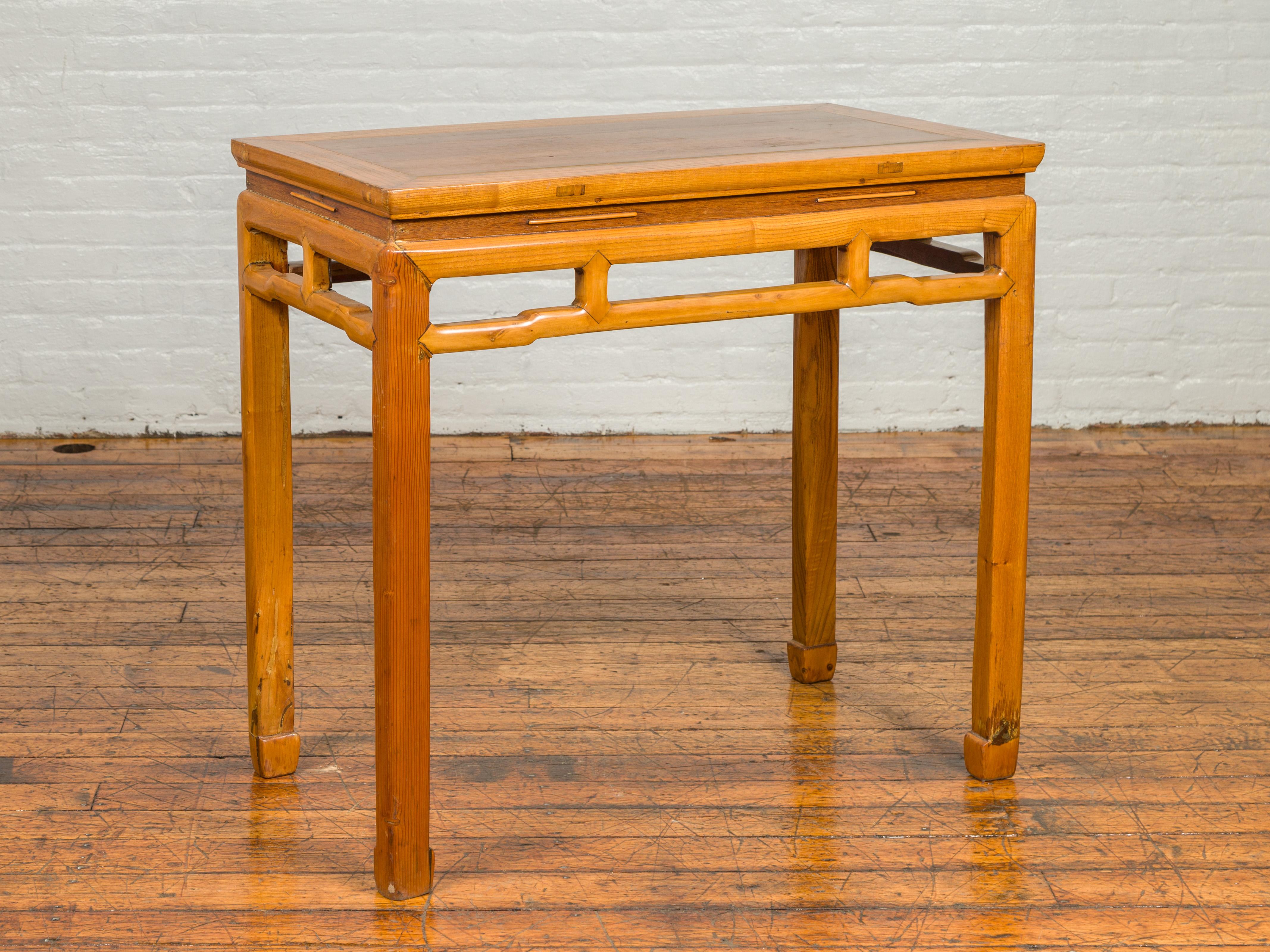 Carved Ming Dynasty Style Vintage Elm Waisted Table with Humpbacked Stretcher For Sale