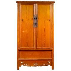 Antique Chinese Ming Style Elm Wardrobe with Two Doors, Hidden Drawers and Carved Skirt