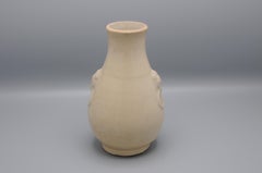 Chinese Ming style pear shaped monochrome vase with elephants heads