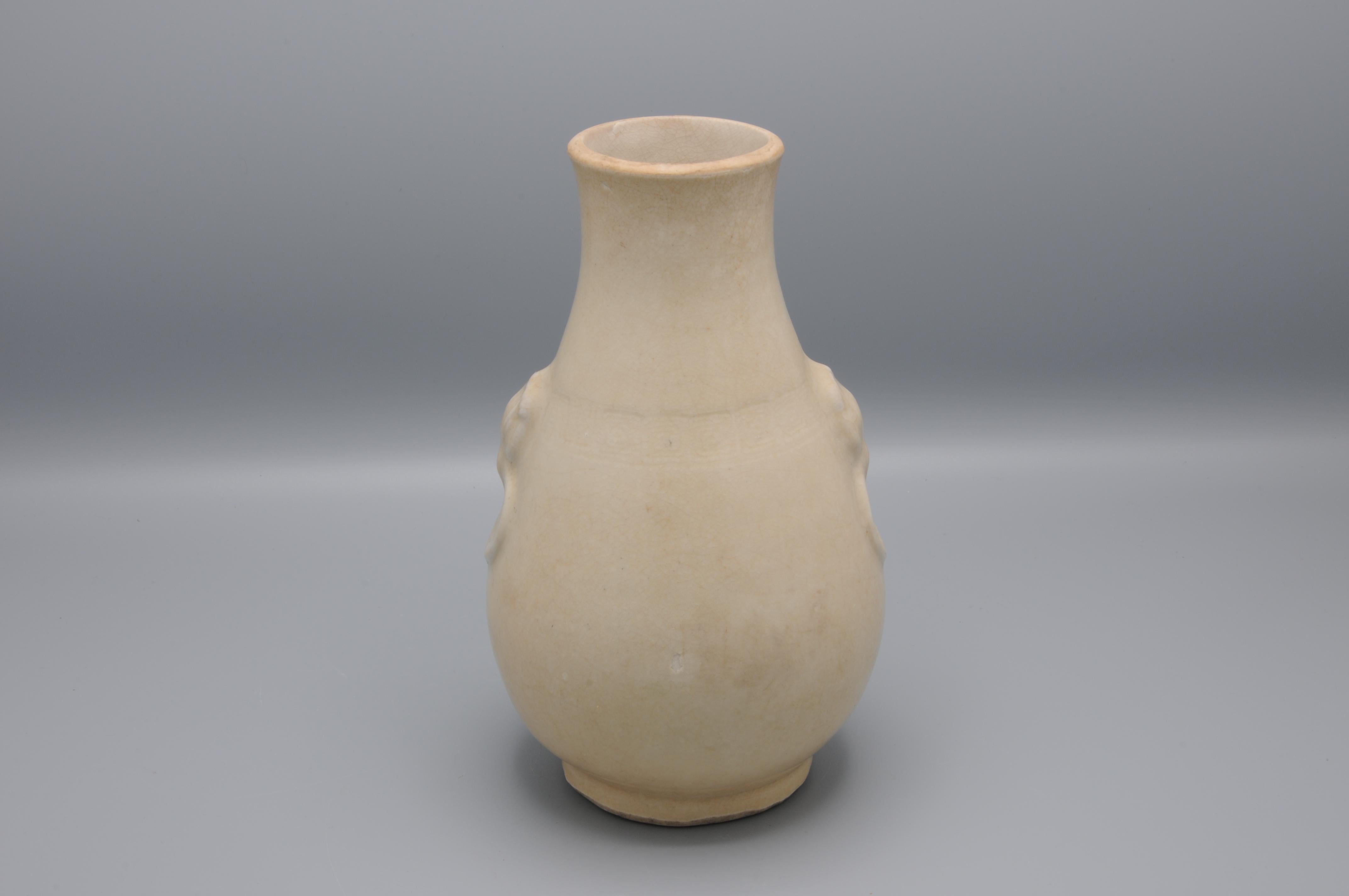 Porcelain Chinese Ming style pear shaped monochrome vase with elephants heads For Sale