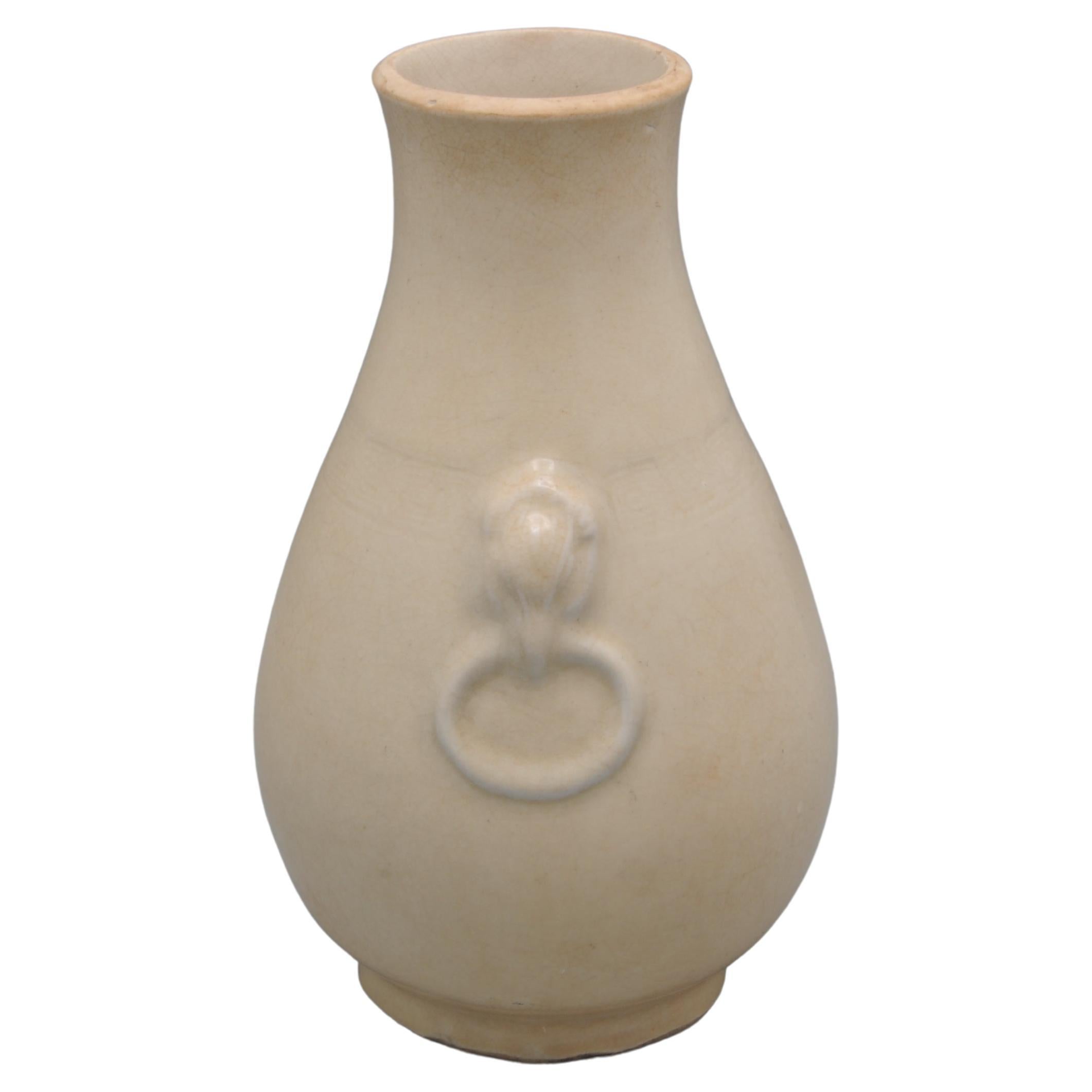 Chinese Ming style pear shaped monochrome vase with elephants heads
