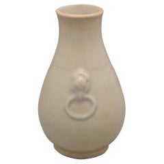 Chinese Ming style pear shaped monochrome vase with elephants heads