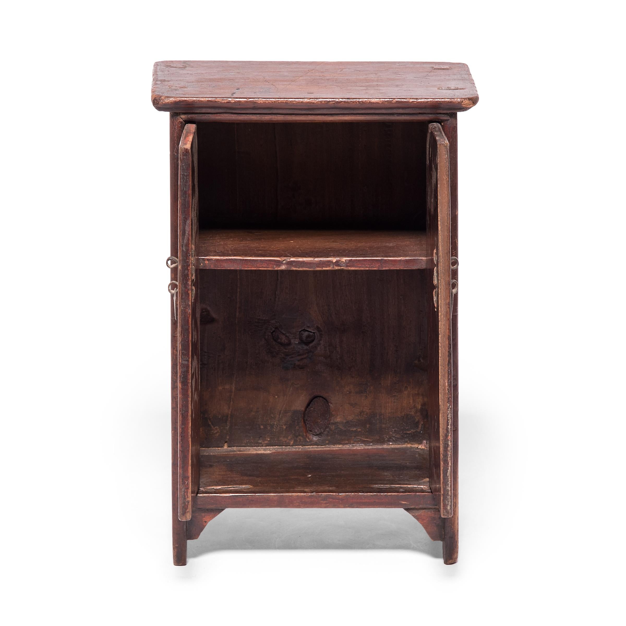 A treasure of a chest, this charming miniature cabinet is named for the narrow, rounded molding that surrounds the frame and resembles noodles. Lacquered rich red, the small cabinet exhibits the same high level of craftsmanship found in larger such