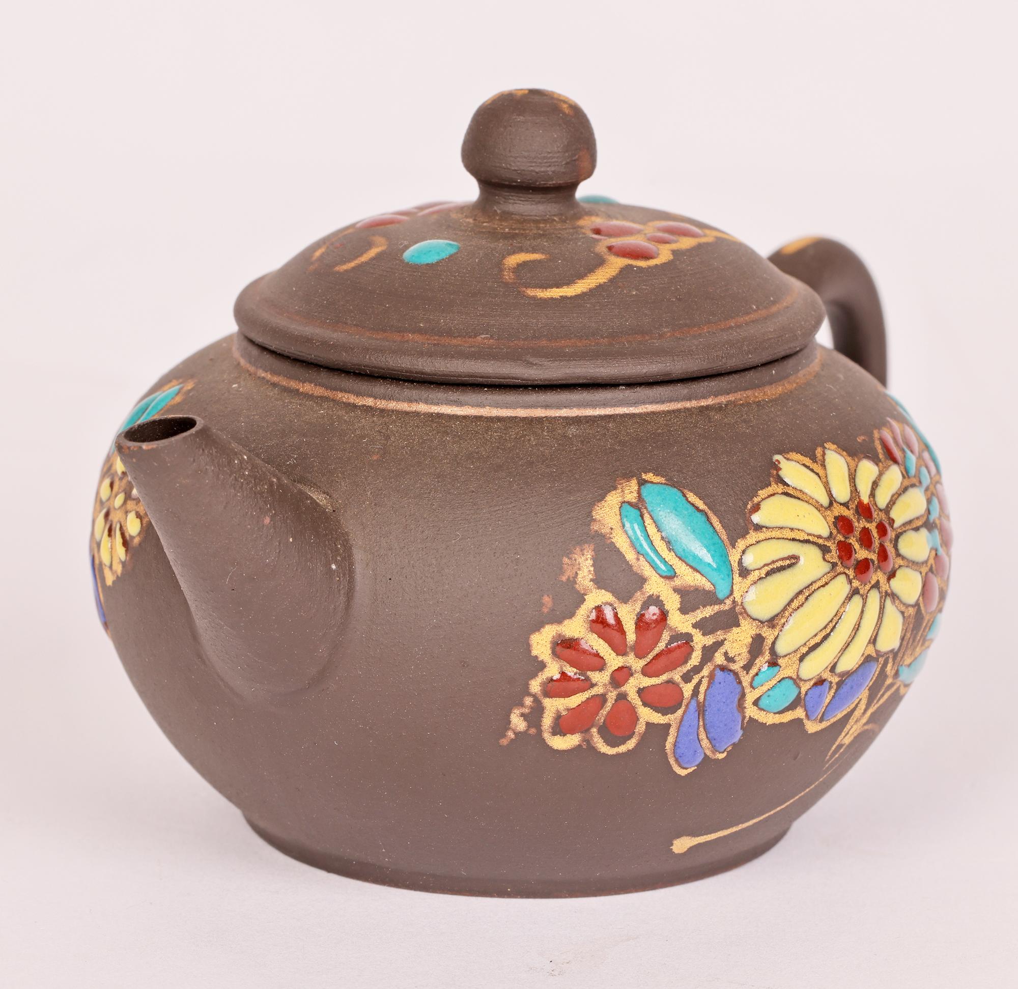Pottery Chinese Miniature Yixing Teapot with Applied Floral Enamel Designs  For Sale