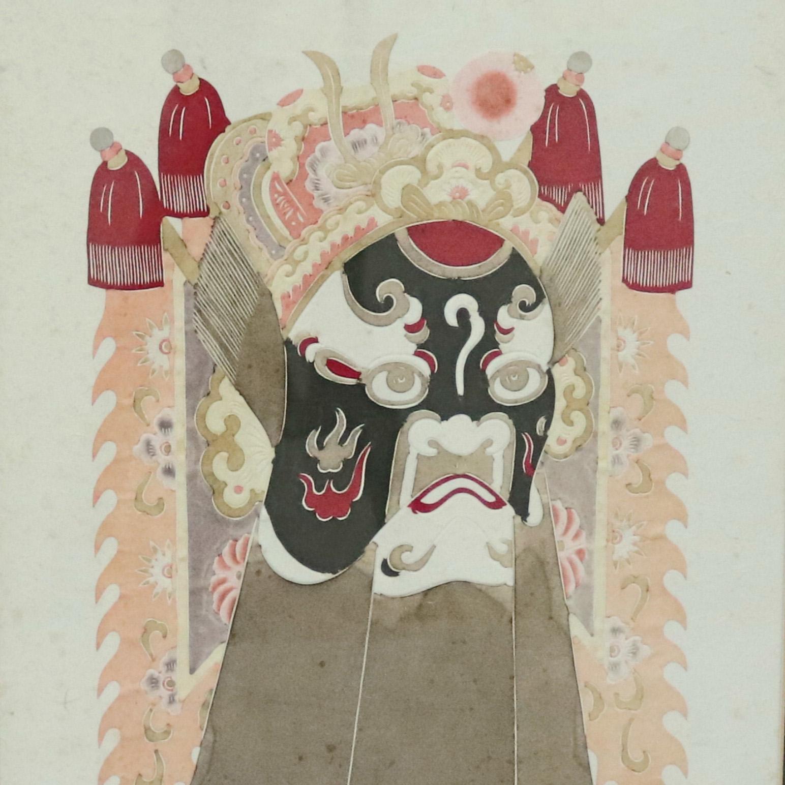 A Chinese framed print offers mixed media depiction of ceremonial deity mask, 20th century

Measures - 18