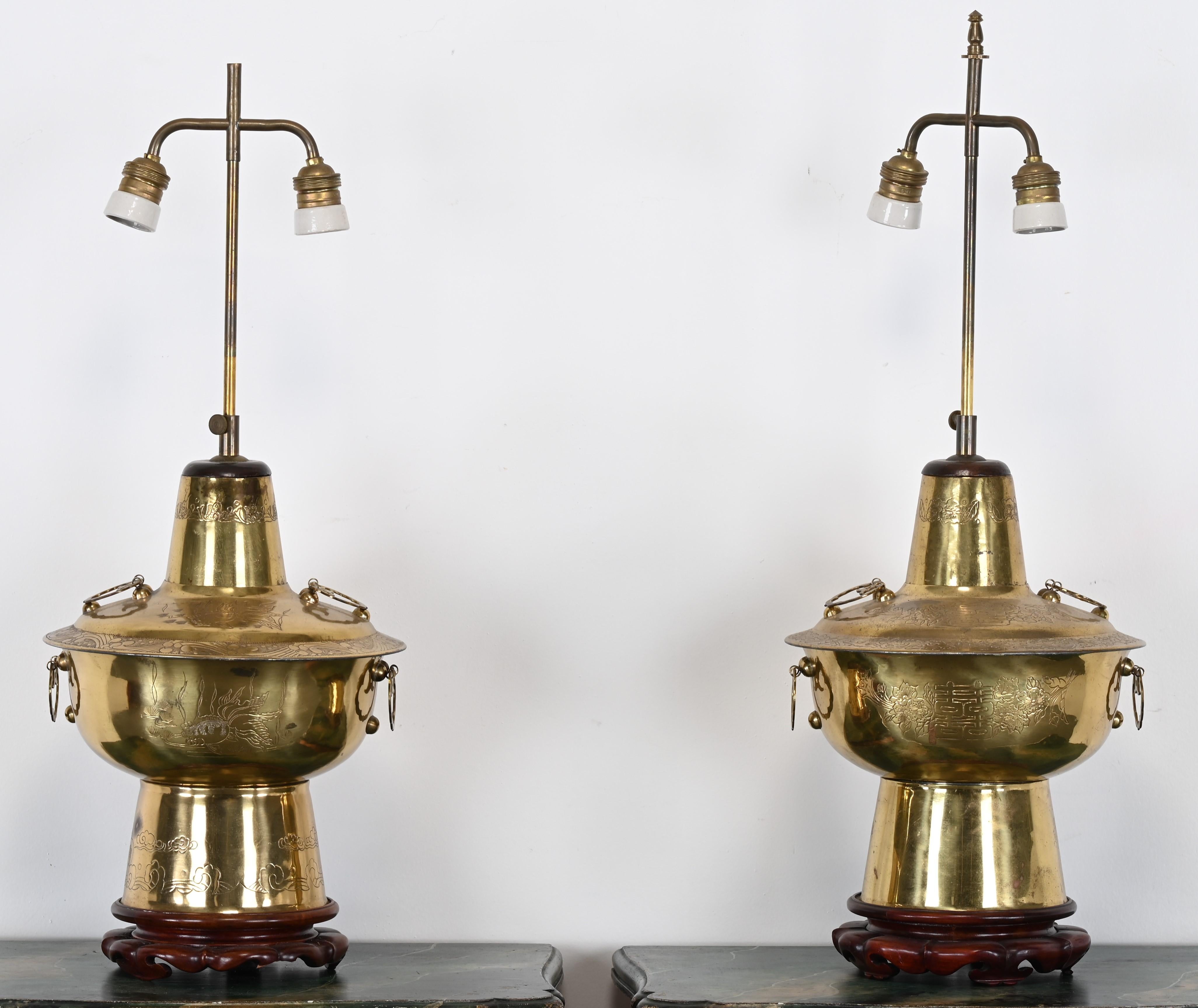A stunning pair of mid-century Asian Style solid brass lamps with handsome wood bases. Pierced designs and etched accents on brass. Would look great in any Asian style, antique, or modern style setting. Great decorator-style! Good condition with