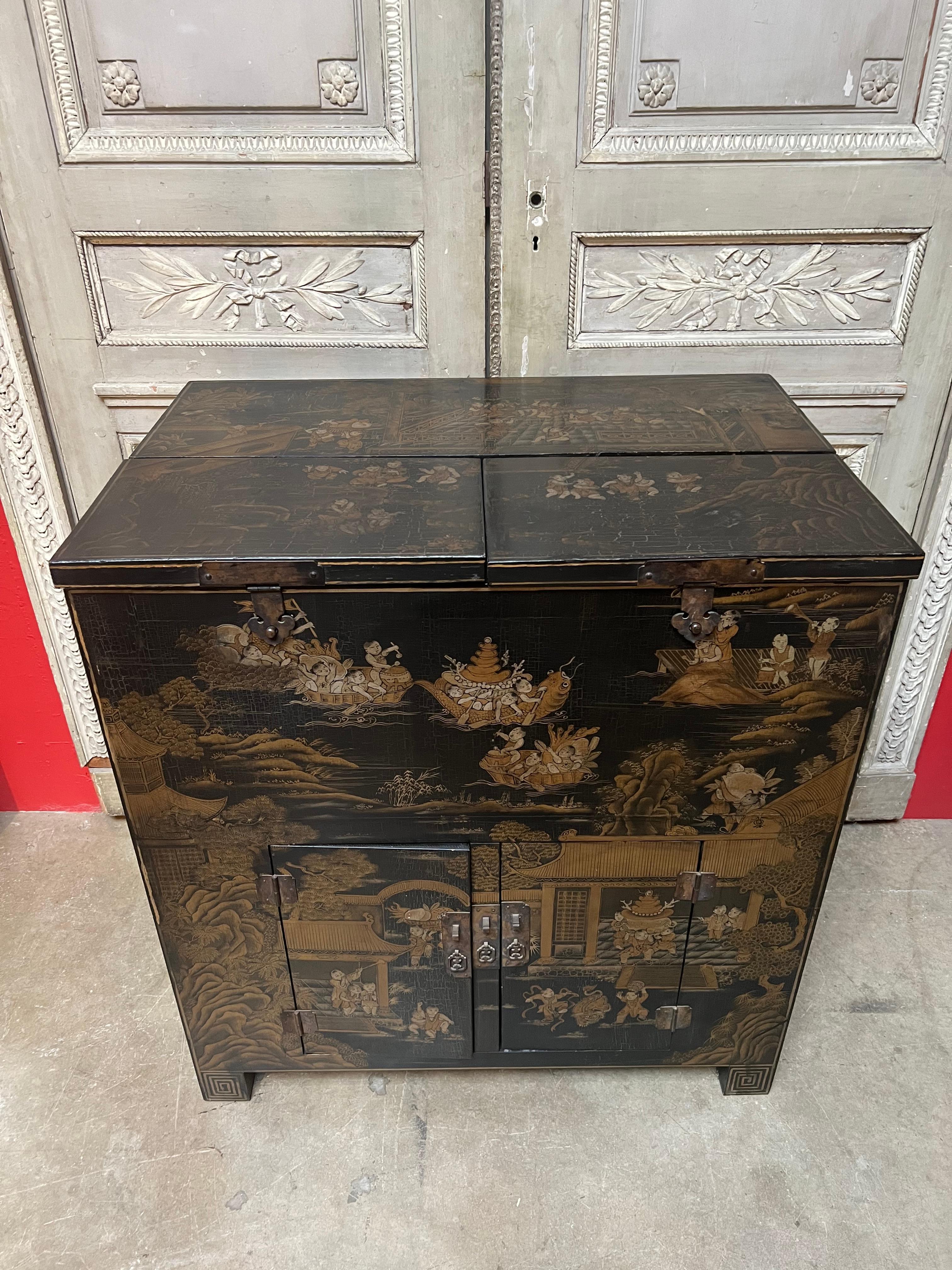 Carved Chinese Money Chest in Black Lacquer and Gilt Decoration For Sale