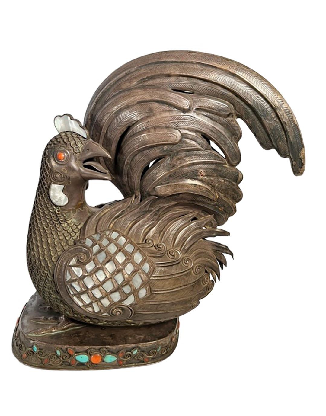 A pair of Chinese Mongolian style solid silver roosters engraved and inlaid with mother of pearl and turquoise. China, circa 1850. 