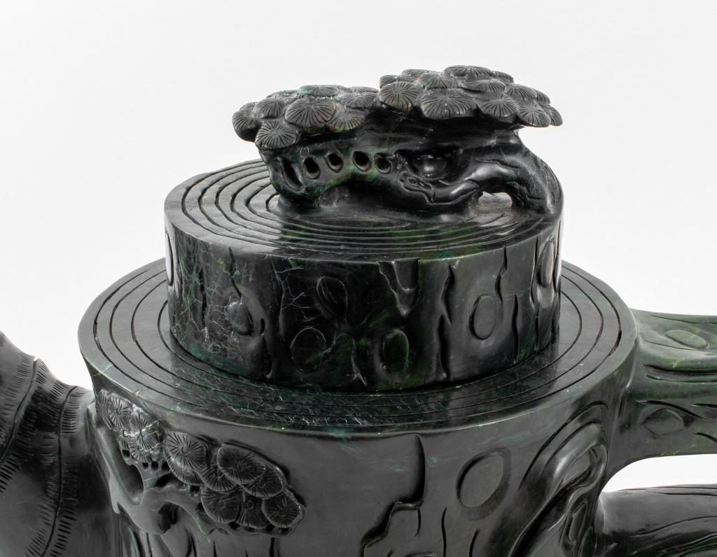 Monumental Chinese Nephrite Teapot, carved from hardstone in the Zhoupan Hu or compass form.

Dealer: S138XX