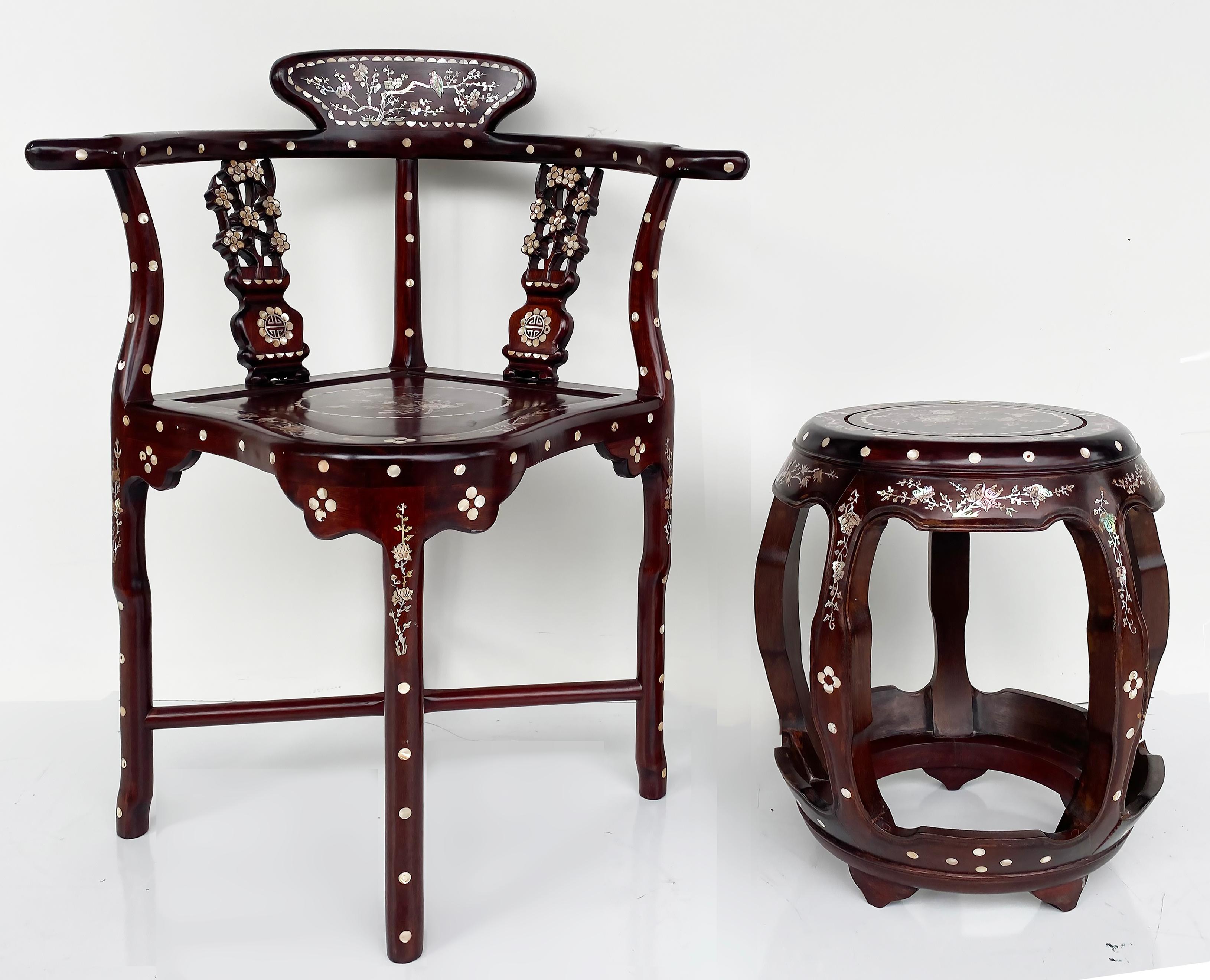 Chinese Mother of Pearl Fine Intricately Inlaid Corner Chair 

Offered for sale is a lovely Chinese mother-of-pearl inlaid padouk wood corner chair with sturdy cross stretchers supporting the base.  The matching side table that is pictured in the