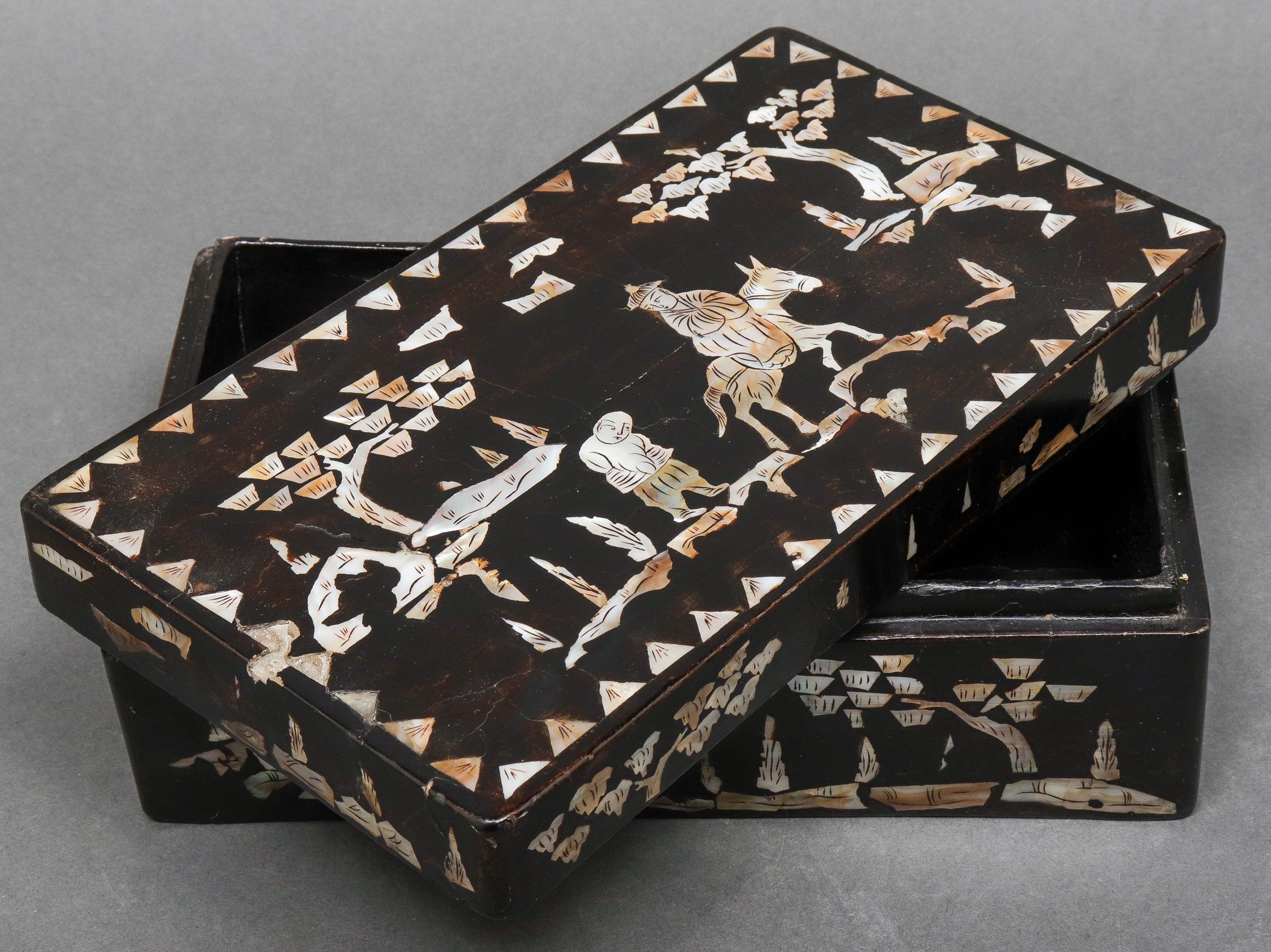 Chinese mother of pearl inlaid lacquered rectangular box, depicting in landscape, circa late 19th-early 20th century. Measures: 3.5