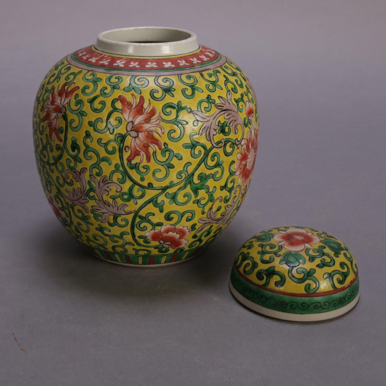 A Chinese enameled ceramic covered ginger jar in the foliate lotus Mun Shou pattern on yellow ground, CHINA mark on base, 20th century

Measures: 8