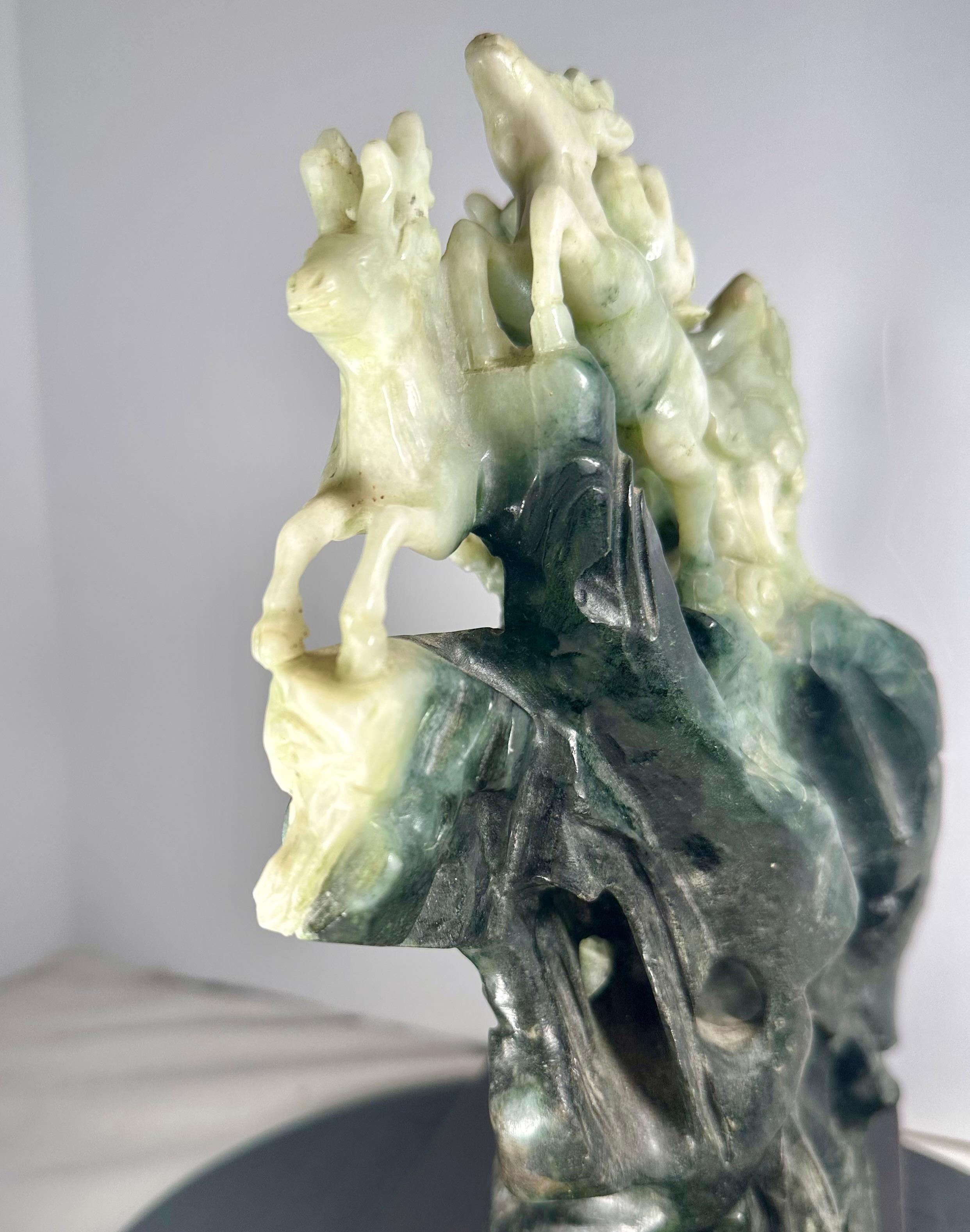 Chinese Natural Large Dushan Jade Carving Qing Dynasty

This is a superb piece of large jade carving from the 19th century. A group of deer are climbing the top of a mountain ridge. The color separation is
magnificent, from dark bluish green to a