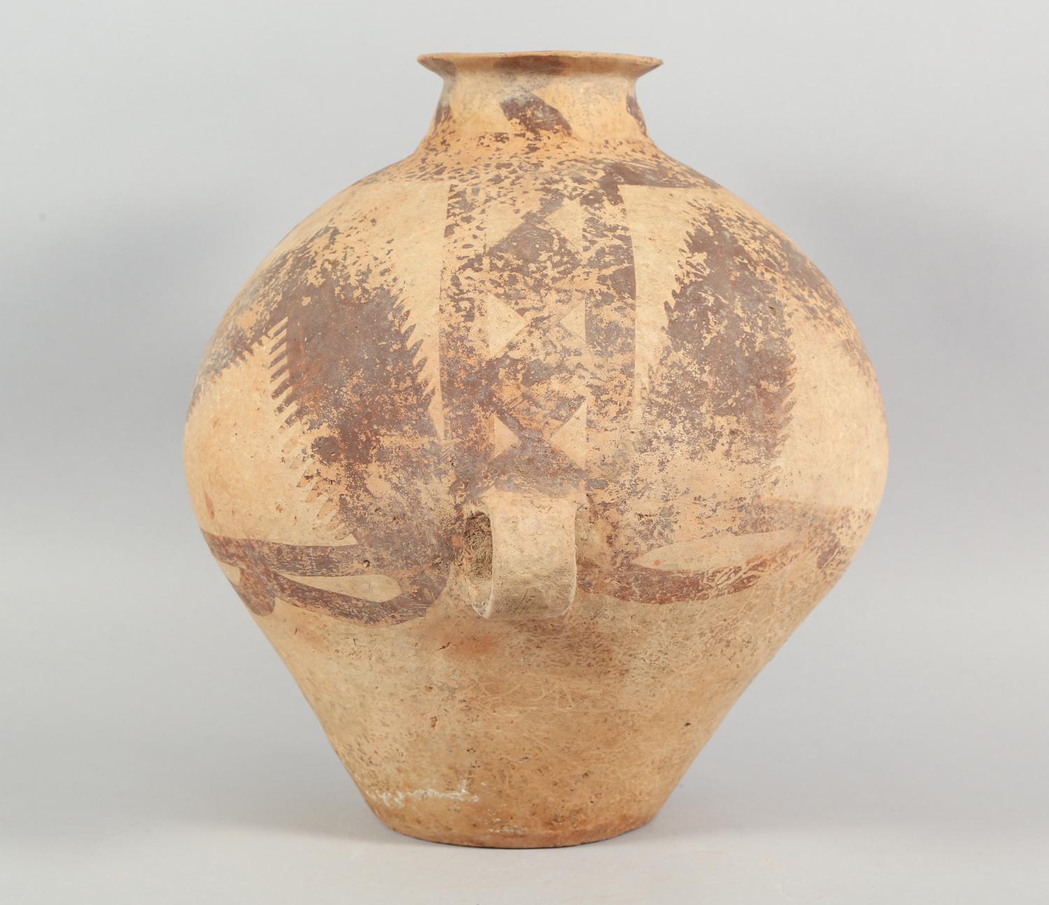 Chinese Neolithic Pottery Jar from the Majiayao Culture, specifically the Machang phase, in northwest China, and dating back roughly 4000 years. Jar is made from earthenware and painted with geometric motifs. Jar has a pear-shaped body, featuring a