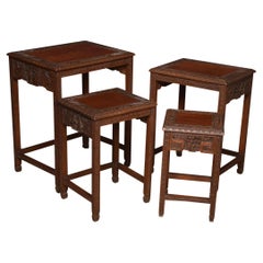 Antique Chinese nest of four tables