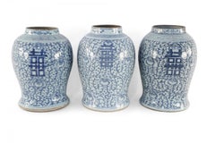 Chinese Off-White and Blue Vine Character Porcelain Urn Vases