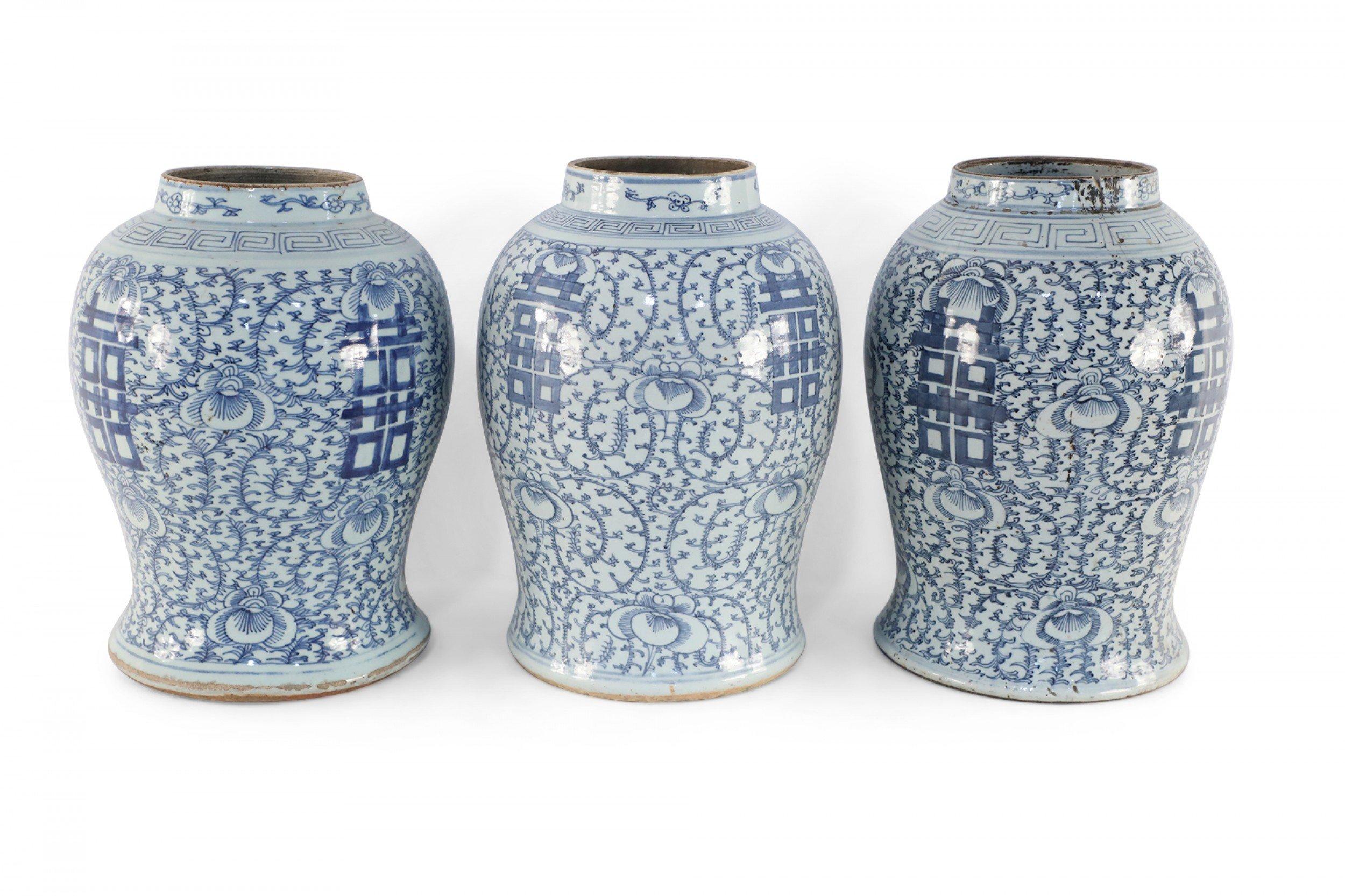 Chinese Export Chinese Off-White and Blue Vine Character Porcelain Urn Vases For Sale