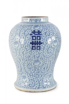 Chinese Off-White and Light Blue Vine Motif Porcelain Urn Vase