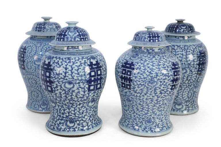 4 Antique Chinese (Early 20th Century) lidded porcelain ginger jars with a swirling light blue dense vines and spaced floral motifs against off-white backgrounds, and bold blue characters on 4 sides and the lids. (PRICED EACH)(Vases vary