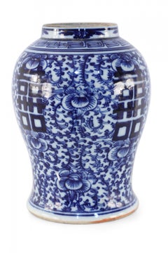 Chinese Off-White and Navy Vine Motif Porcelain Urn Vase